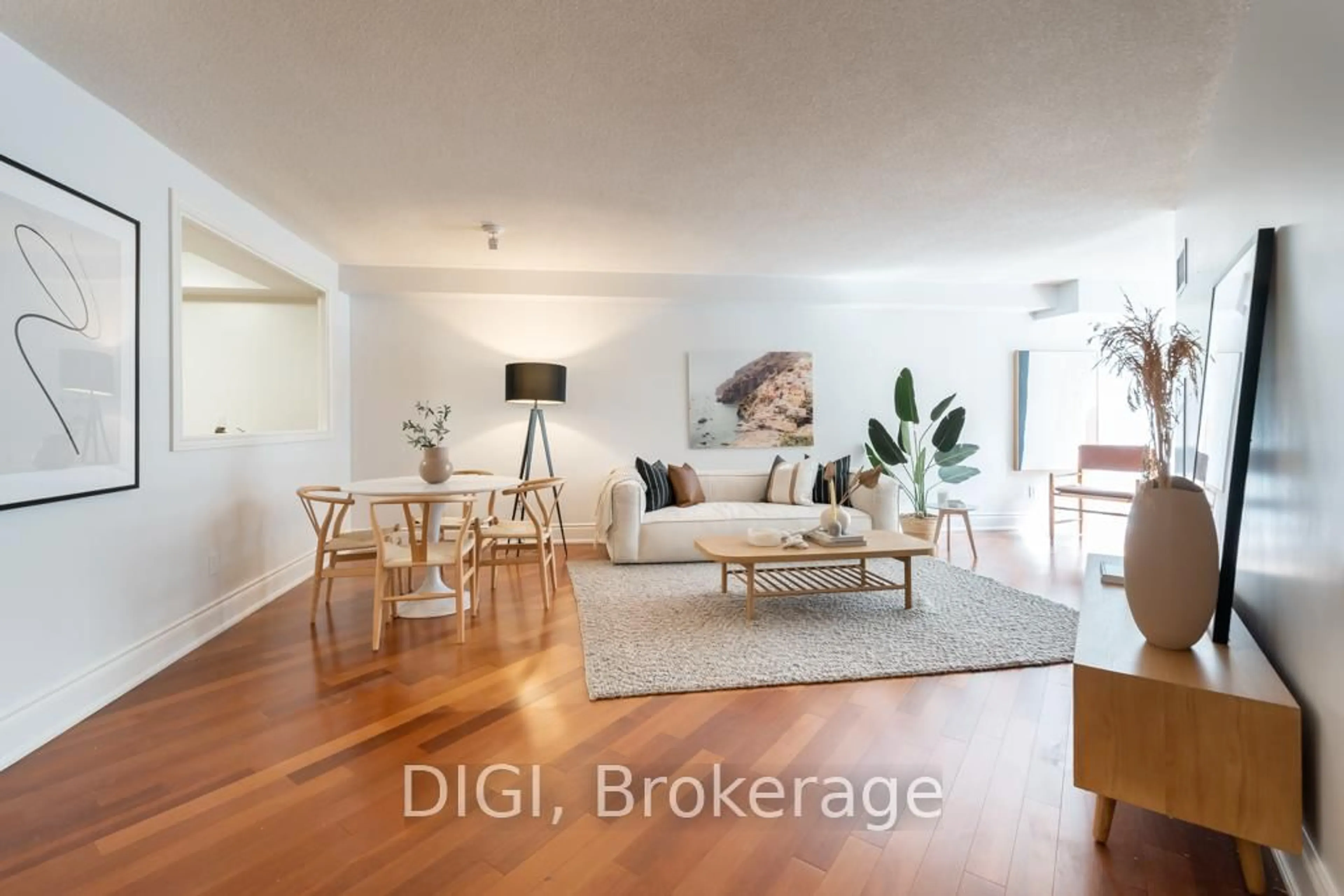 Living room with furniture, wood/laminate floor for 75 York Mills Rd #406, Toronto Ontario M2P 2E7