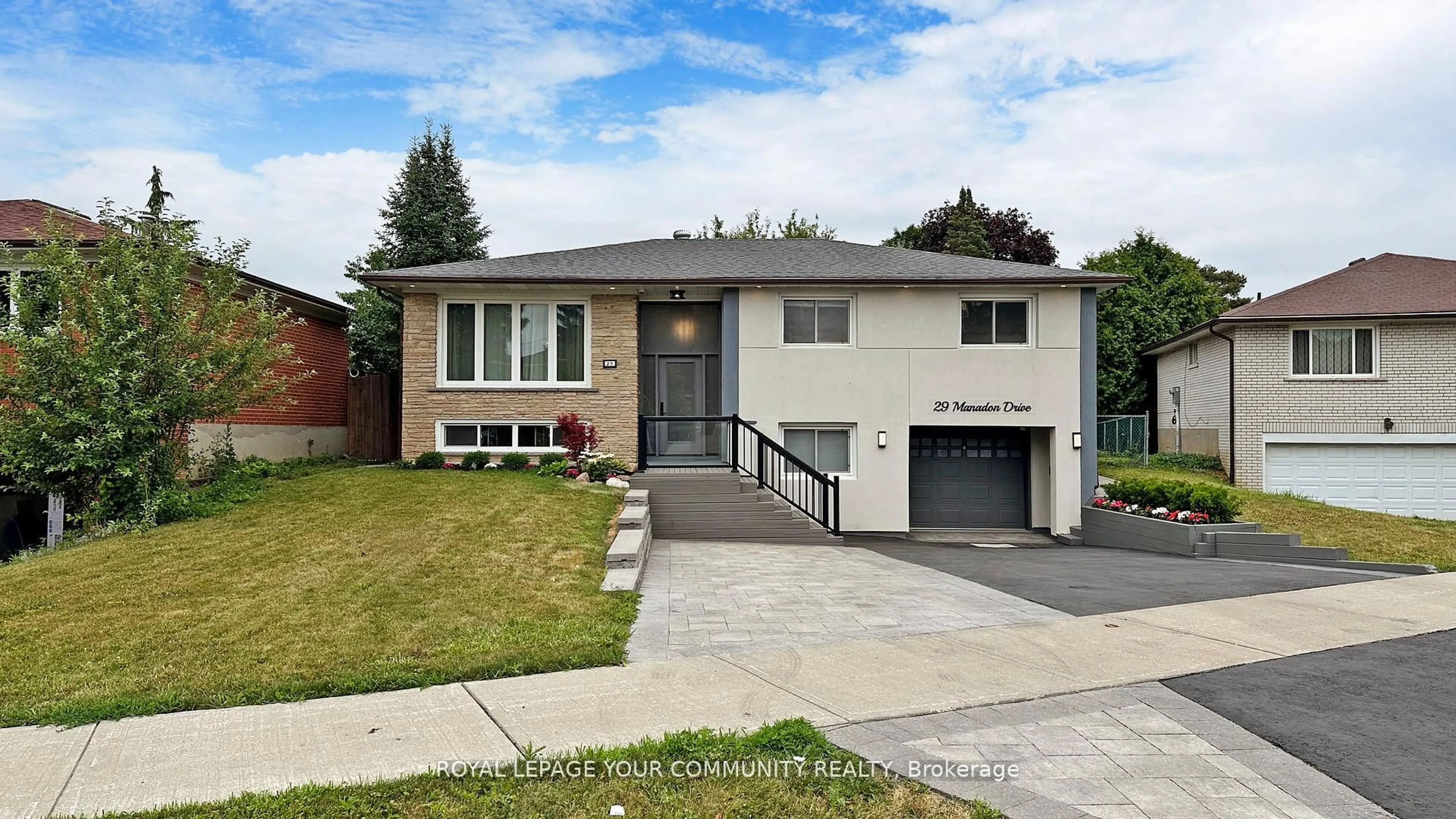 Home with vinyl exterior material, street for 29 Manadon Dr, Toronto Ontario M2M 1W8