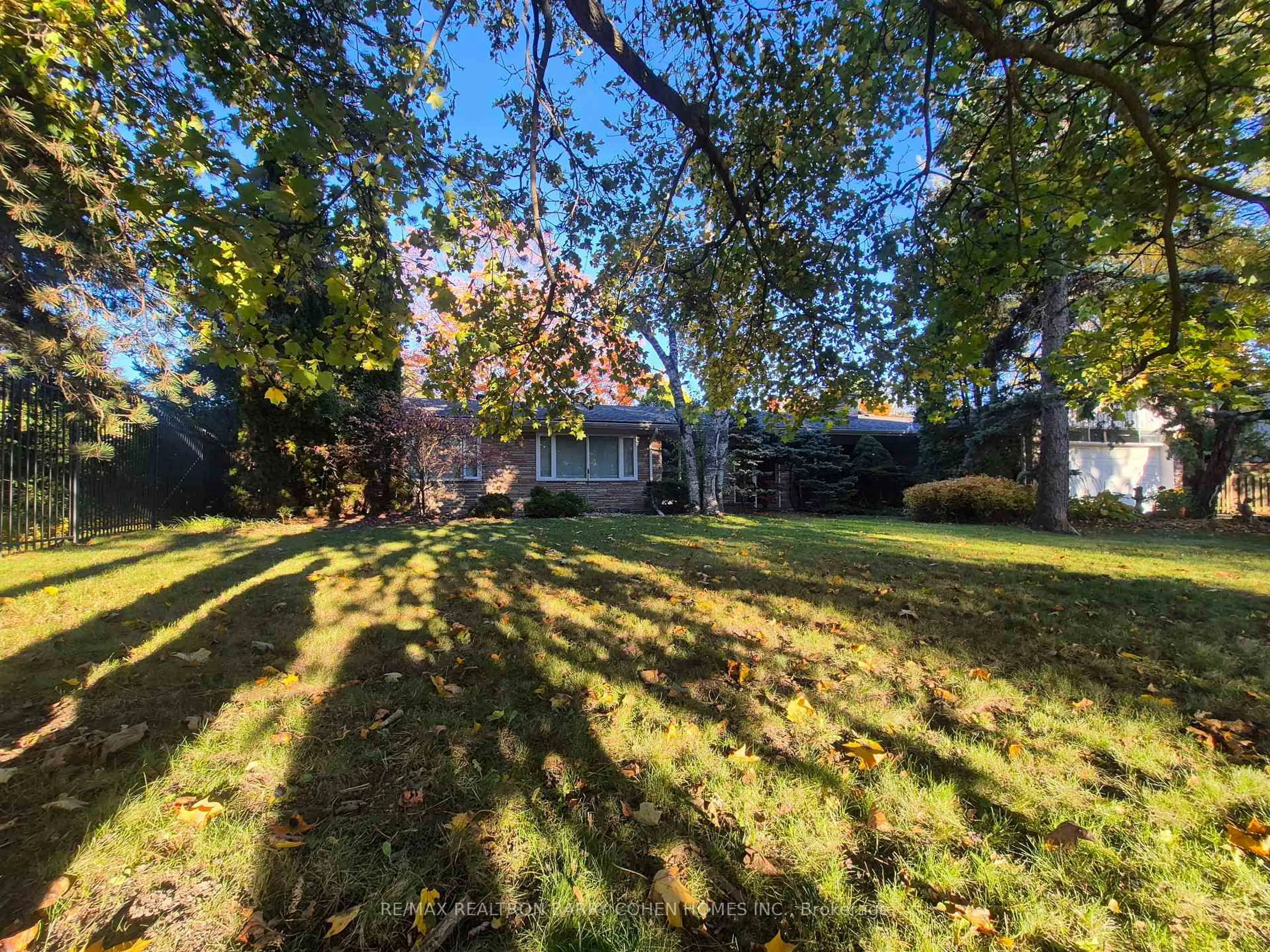 A pic from outside/outdoor area/front of a property/back of a property/a pic from drone, forest/trees view for 16 Wilket Rd, Toronto Ontario M2L 1N6