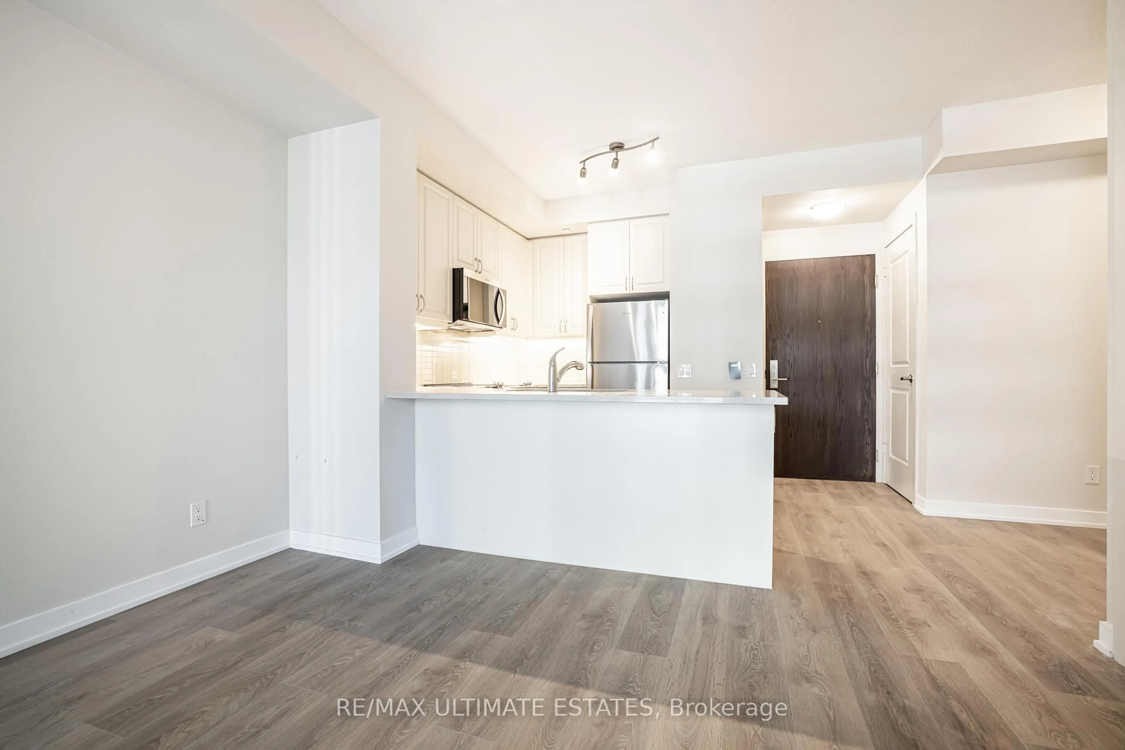 Open concept kitchen, wood/laminate floor for 4955 Yonge St, Toronto Ontario M2N 0L8
