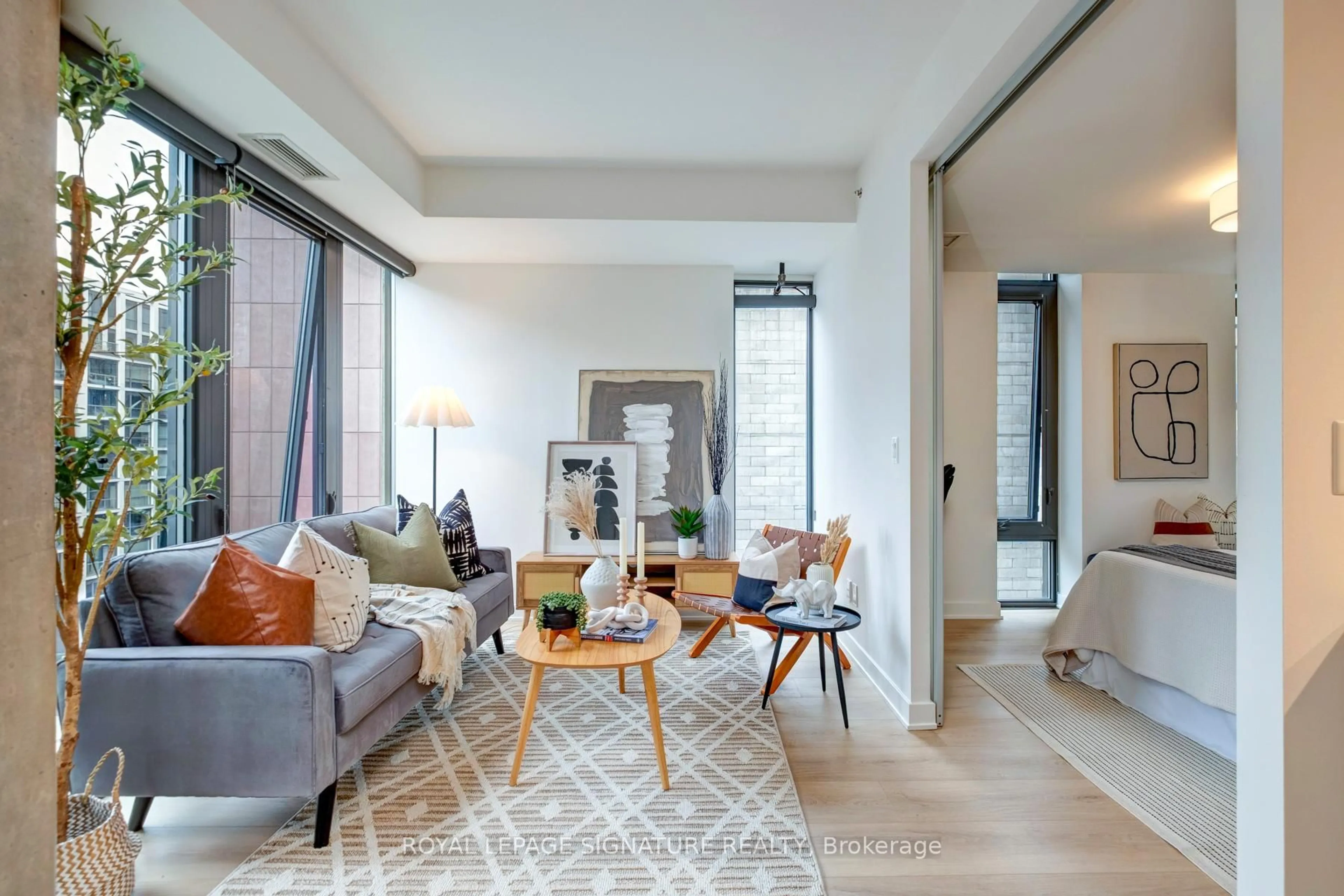 Living room with furniture, unknown for 32 Camden St #704, Toronto Ontario M5V 0G4