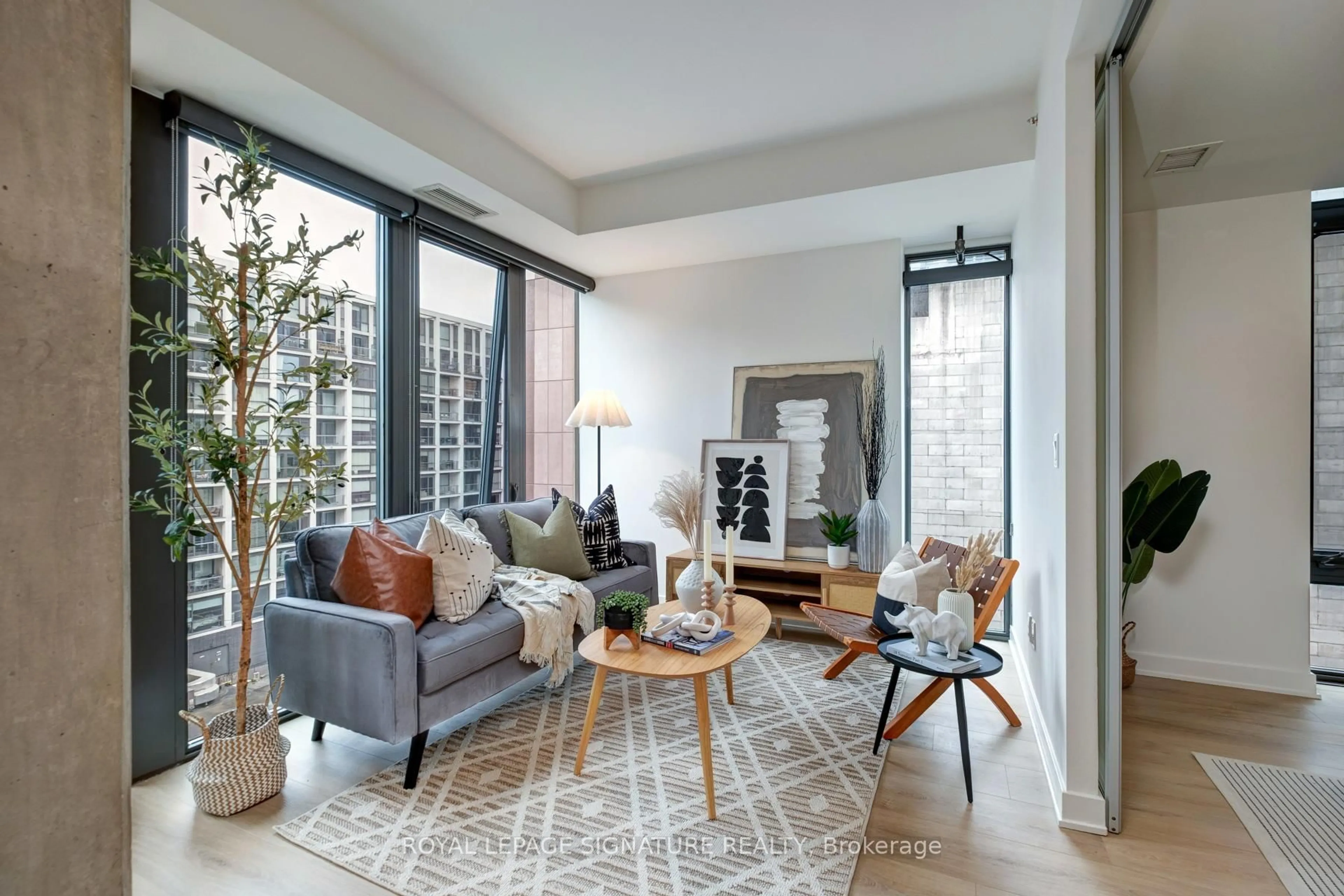 Living room with furniture, unknown for 32 Camden St #704, Toronto Ontario M5V 0G4