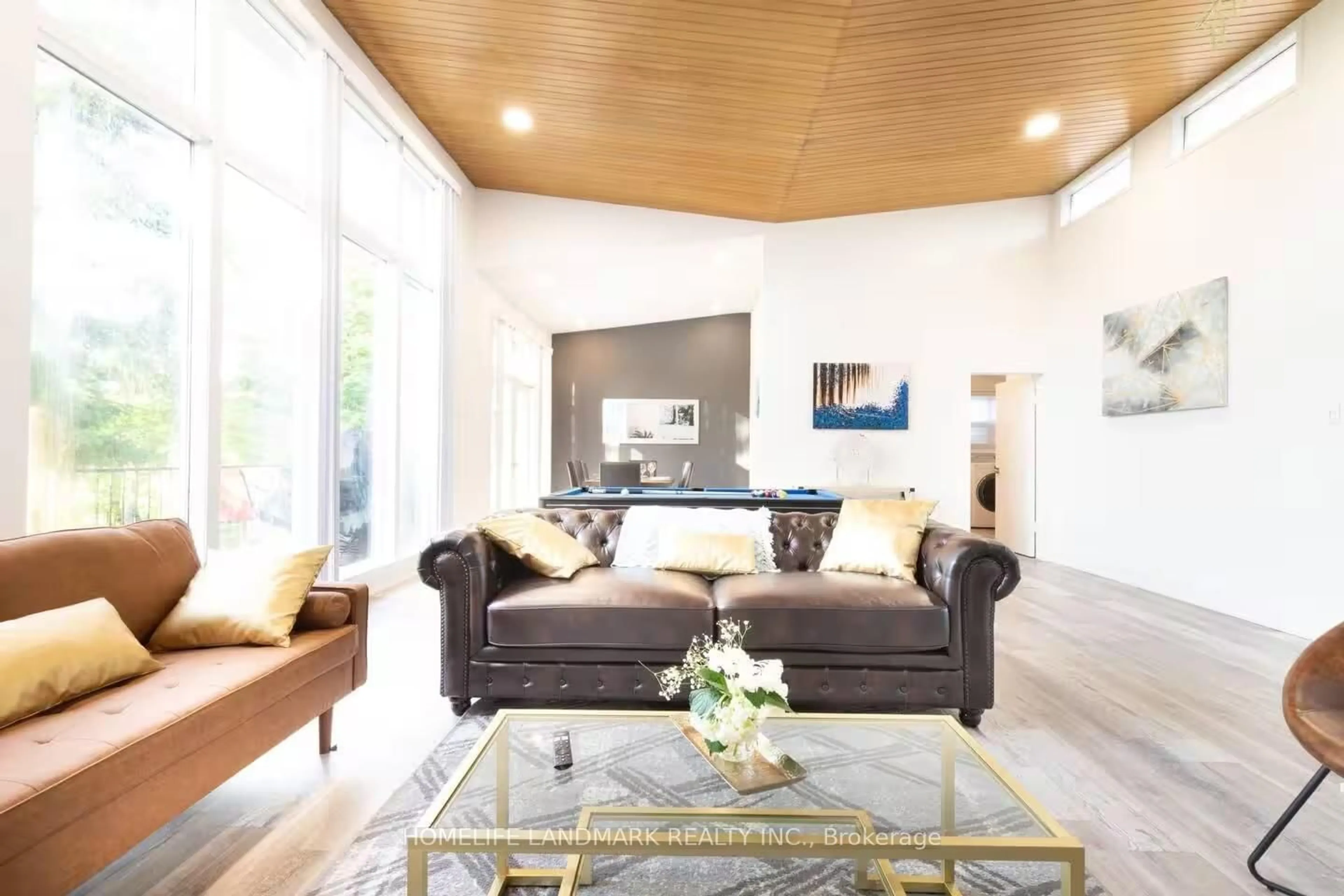 Living room with furniture, wood/laminate floor for 12 Blue Forest Dr, Toronto Ontario M3H 4W2