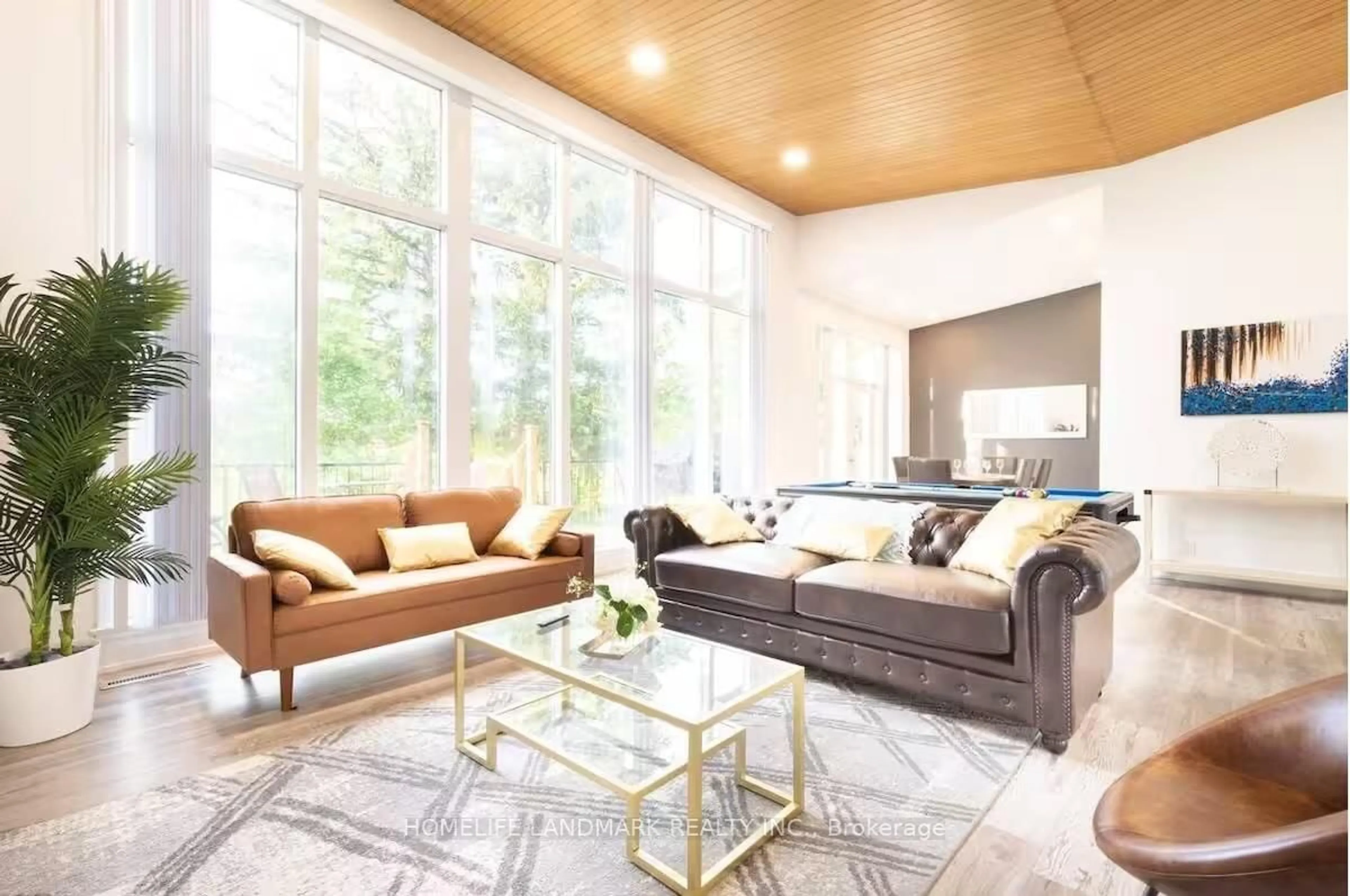 Living room with furniture, wood/laminate floor for 12 Blue Forest Dr, Toronto Ontario M3H 4W2