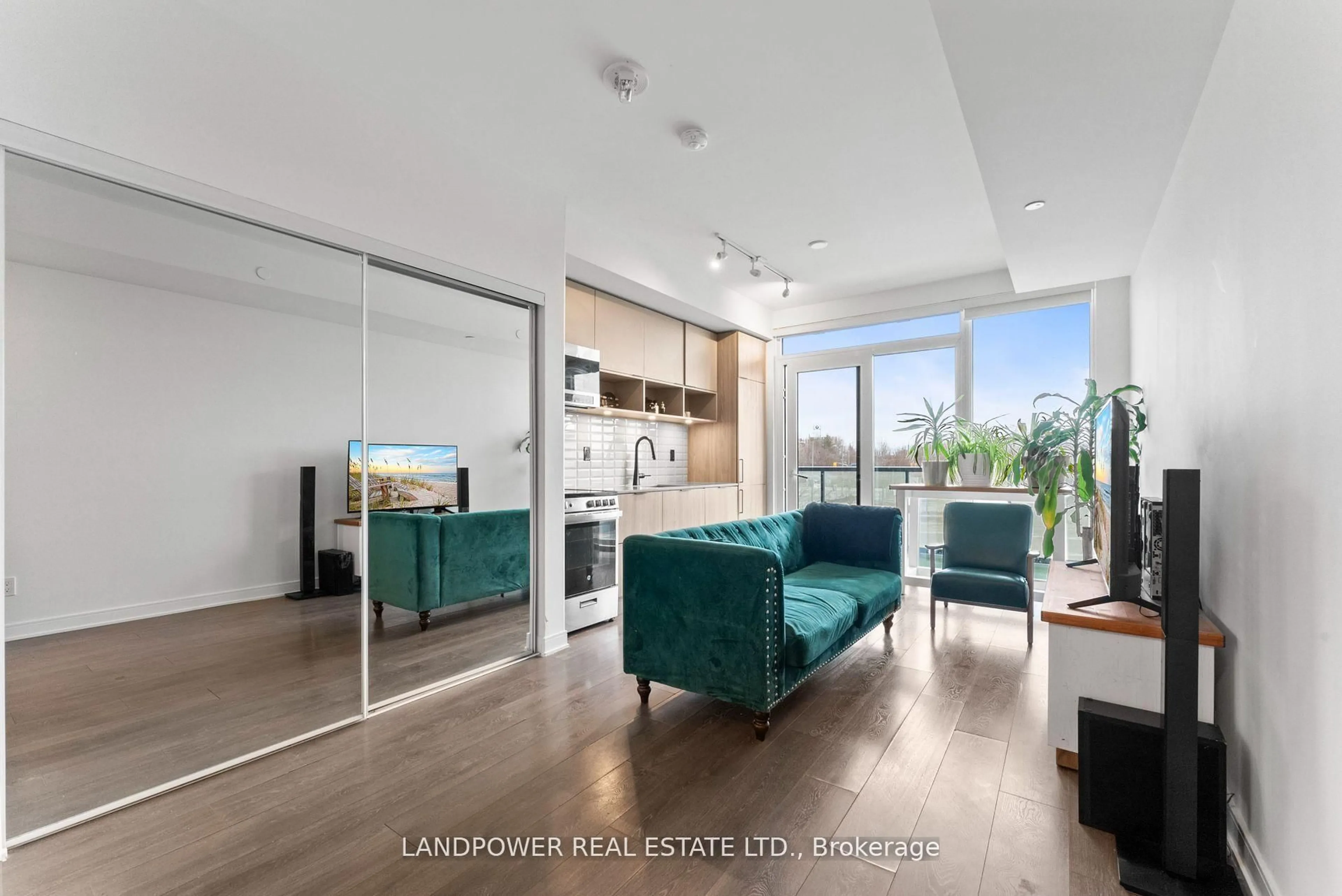 Living room with furniture, wood/laminate floor for 35 Rolling Mills Rd #S439, Toronto Ontario M5A 0V6