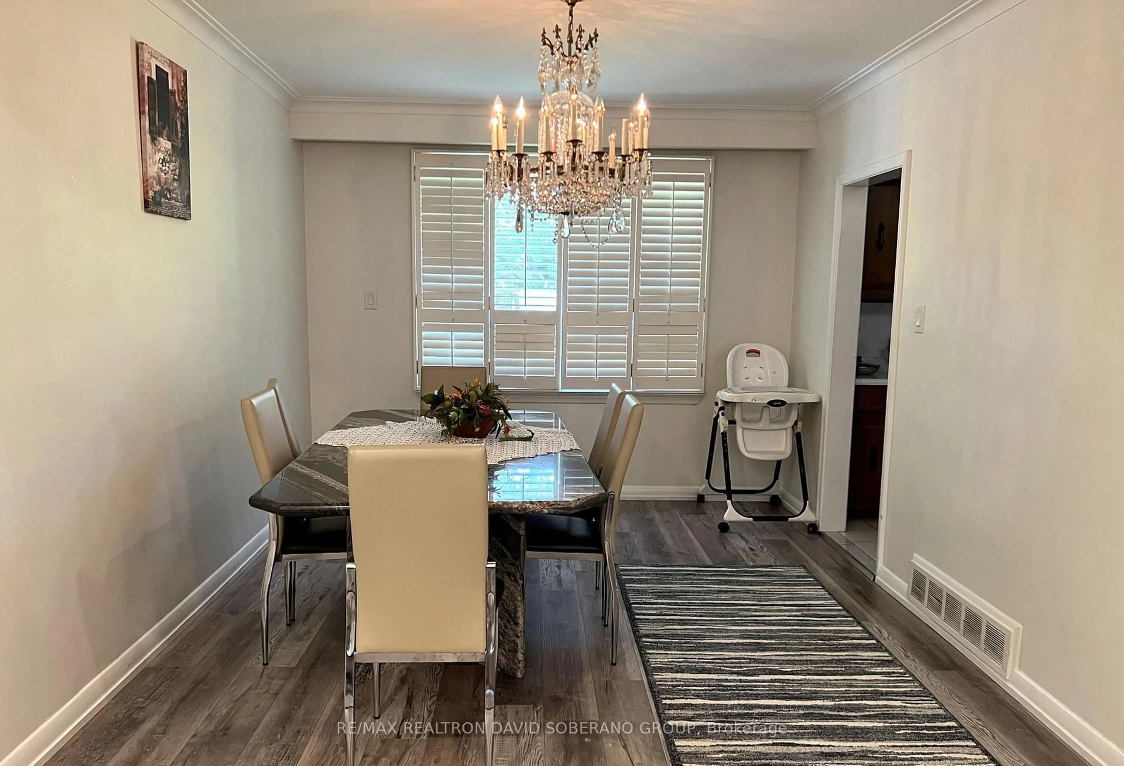 Dining room, wood/laminate floor for 147 Almore Ave, Toronto Ontario M3H 2H9