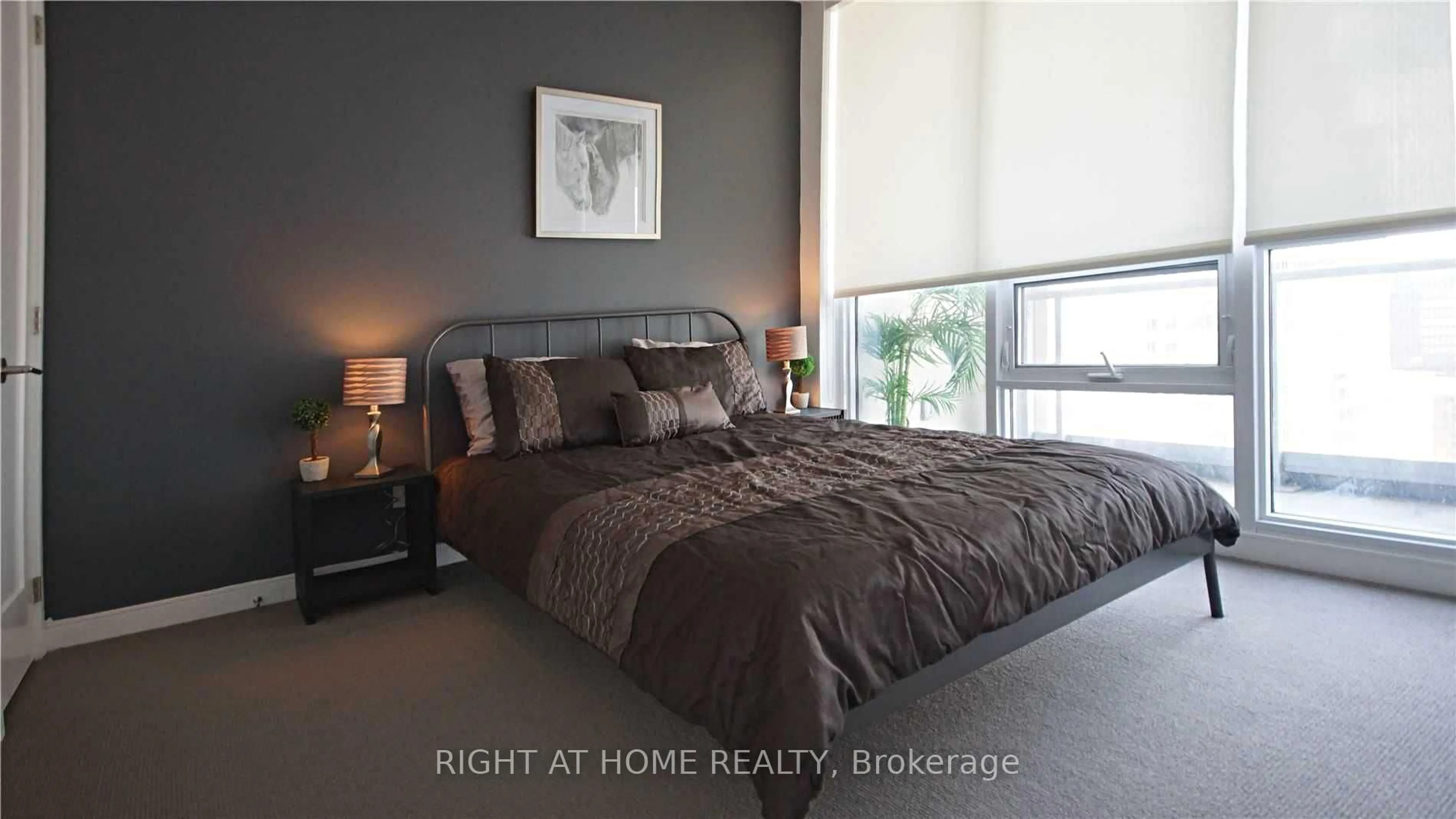 Bedroom with bed, unknown for 88 Scott St #4707, Toronto Ontario M5E 0A9