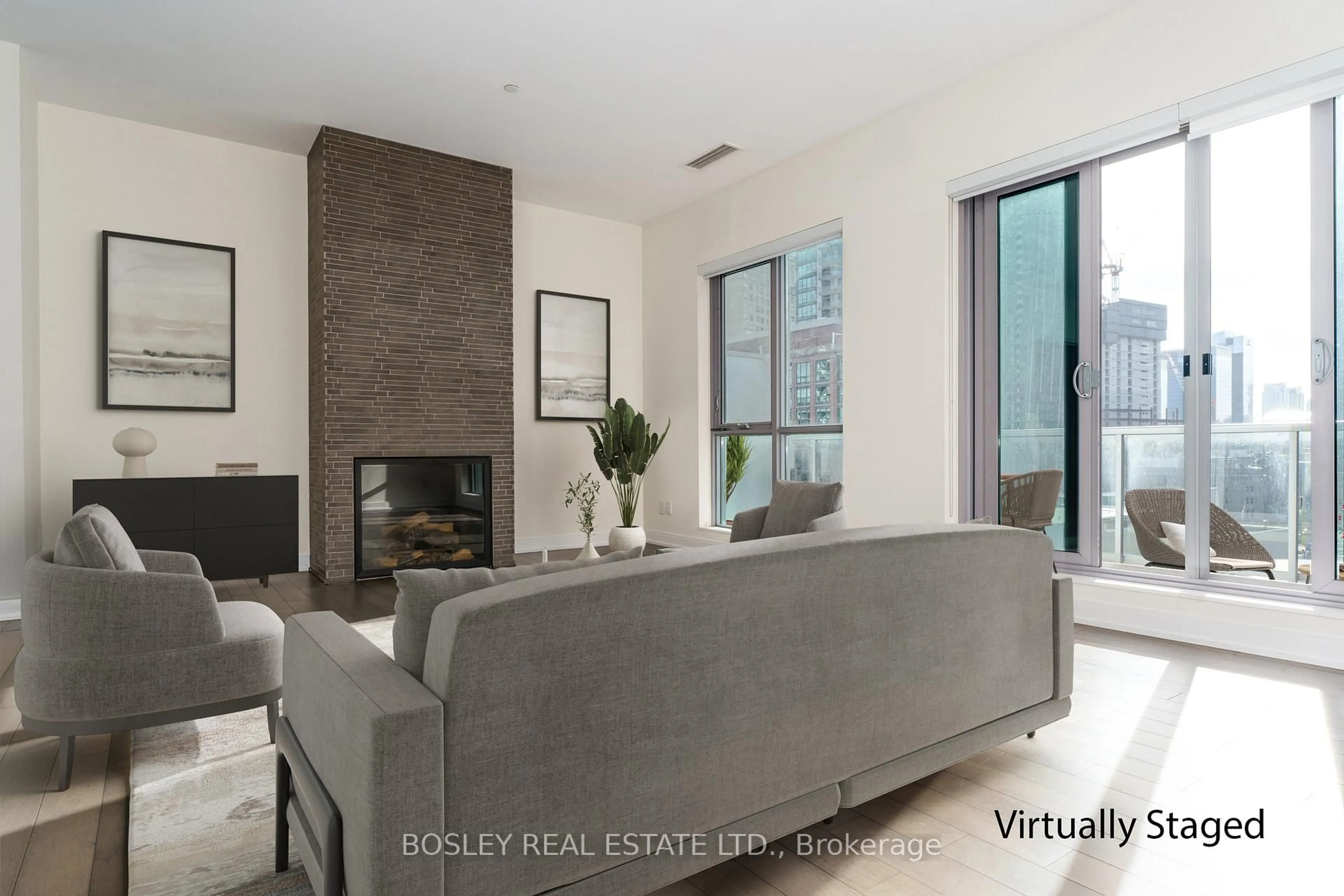 Living room with furniture, unknown for 55 Front St #PH1203, Toronto Ontario M5E 0A7