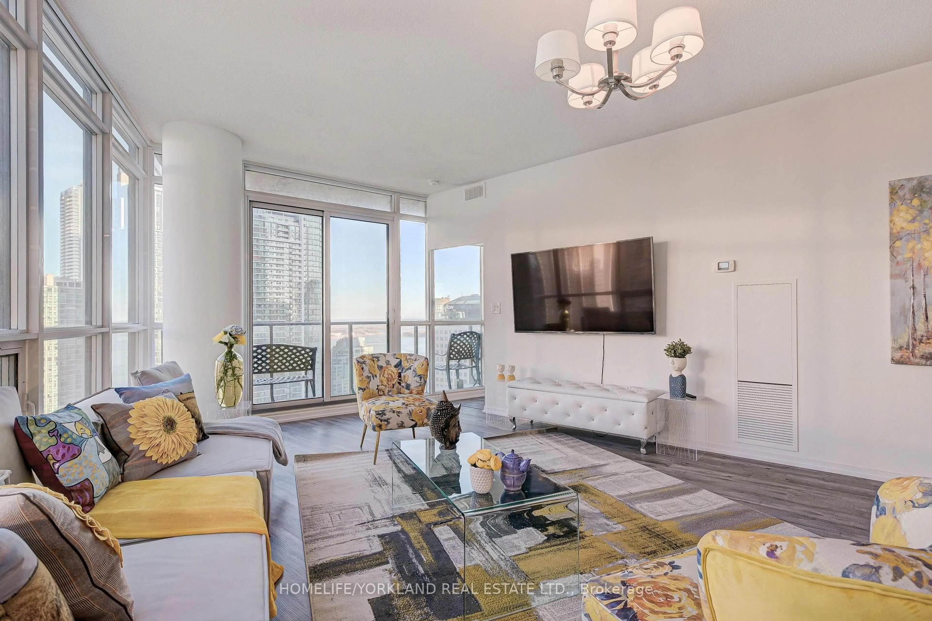 Living room with furniture, unknown for 65 Bremner Blvd #3008, Toronto Ontario M5J 0A7