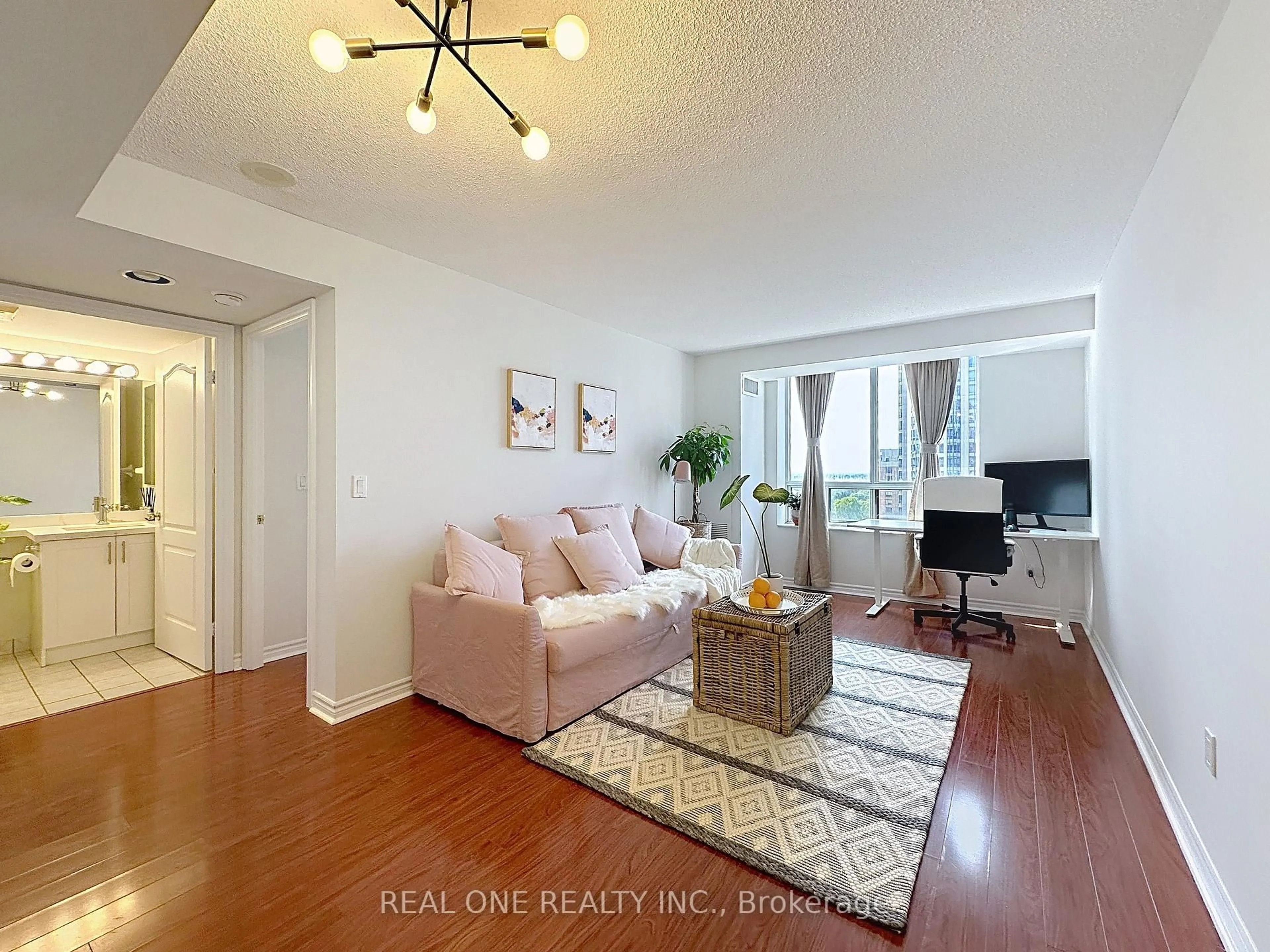 Living room with furniture, wood/laminate floor for 18 Sommerset Way #1708, Toronto Ontario M2N 6X5