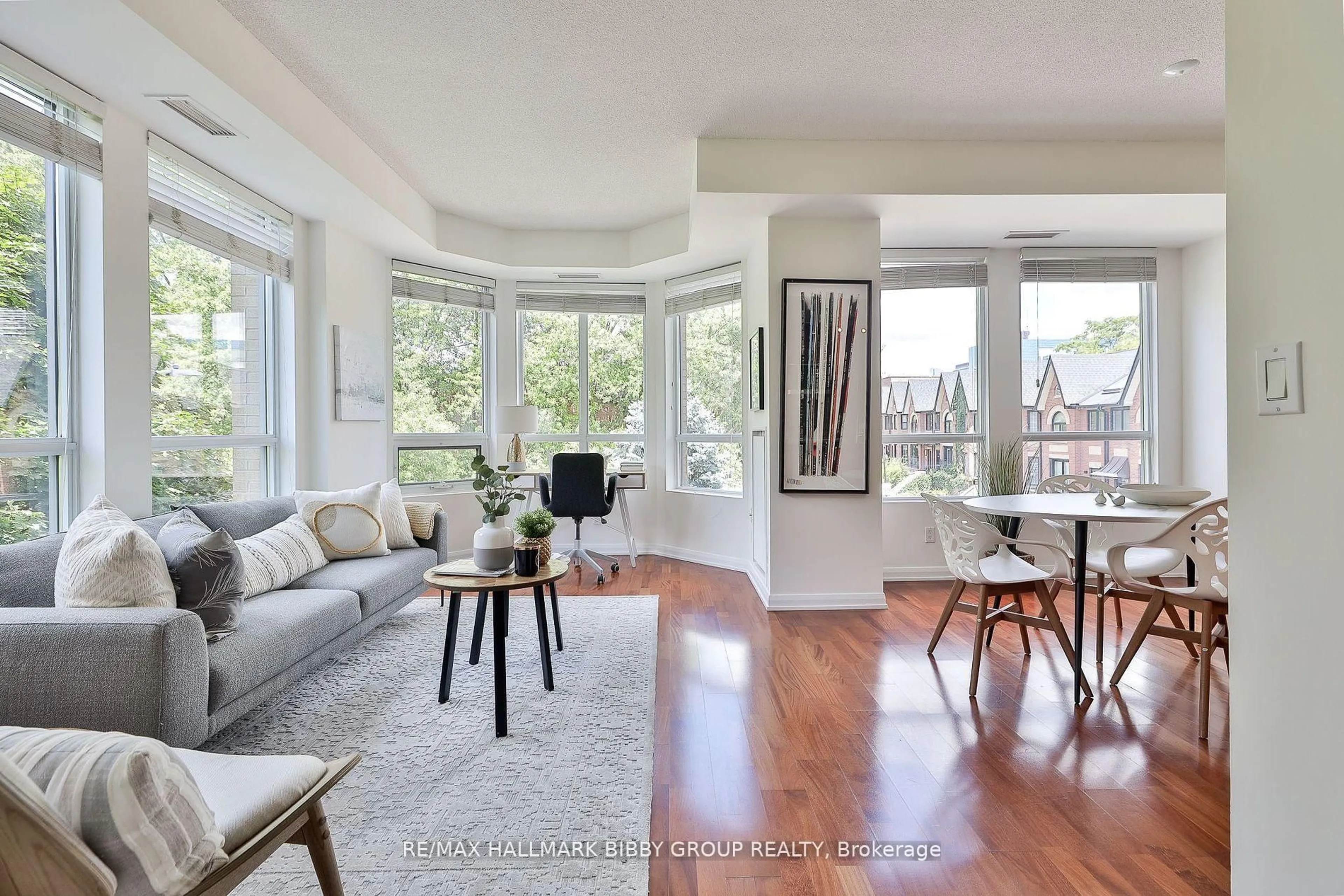 Living room with furniture, wood/laminate floor for 25 Soho St #P302, Toronto Ontario M5T 3L8