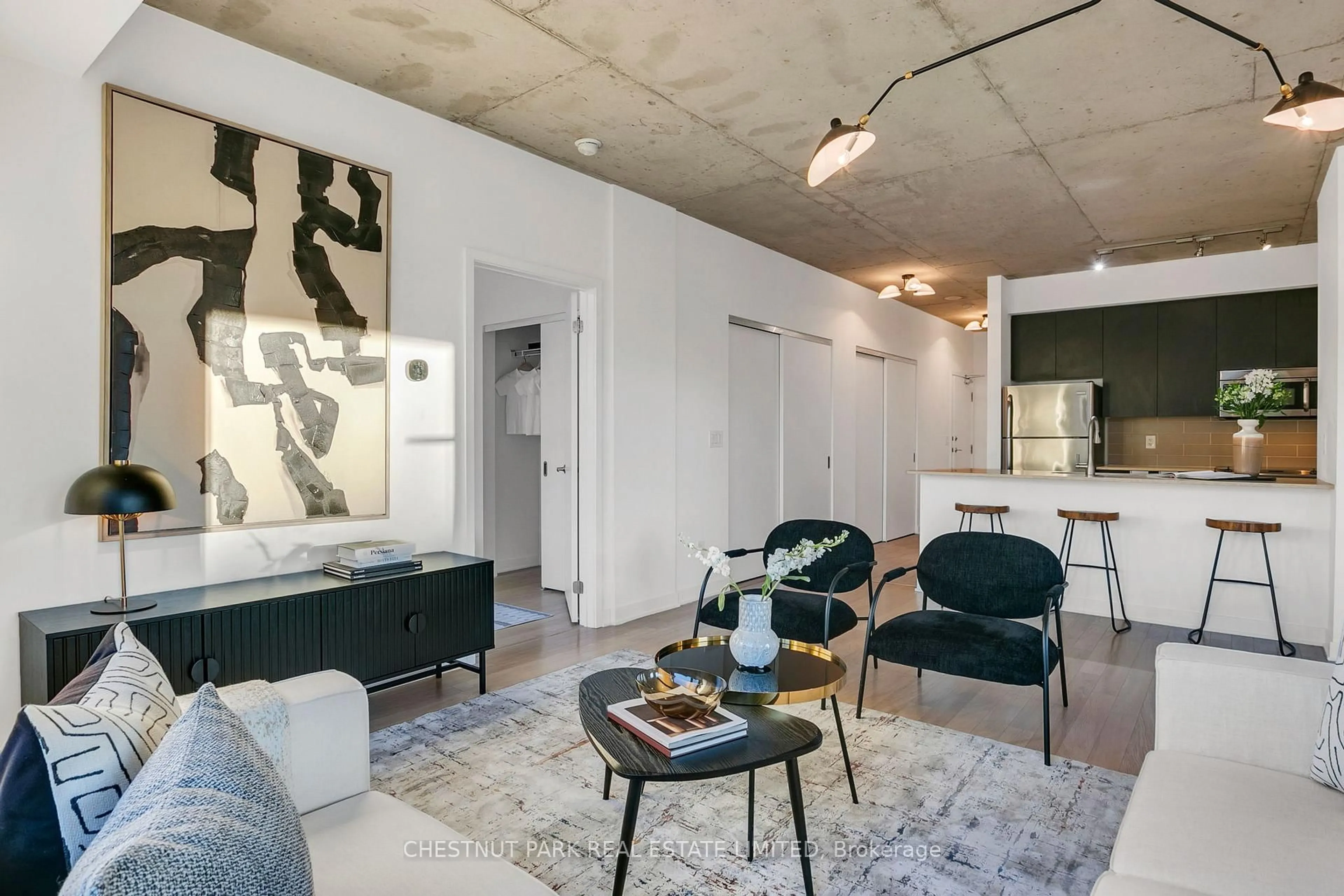 Living room with furniture, cement floor for 400 Wellington St #610, Toronto Ontario M5V 0B5