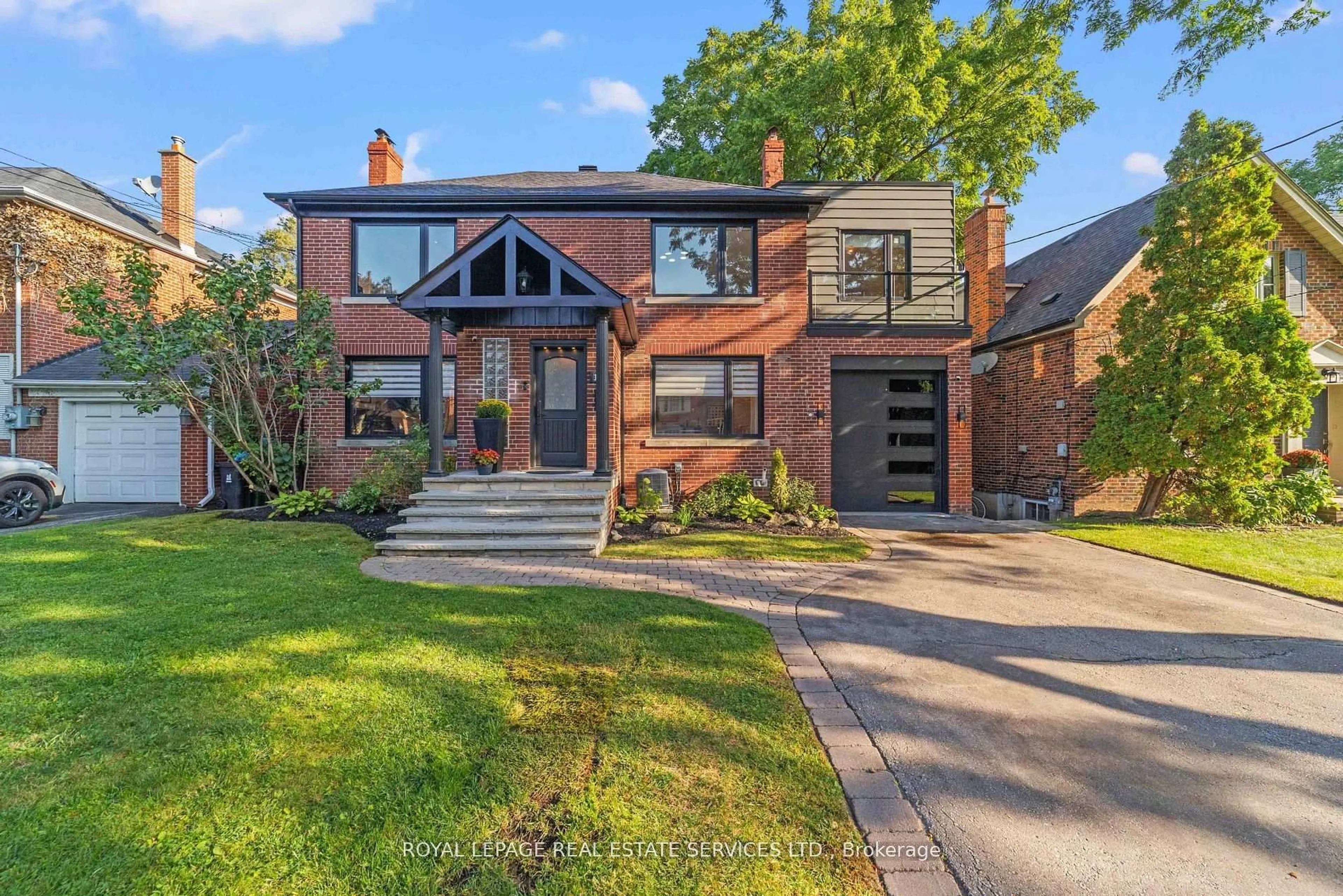 Home with brick exterior material, street for 12 Armour Blvd, Toronto Ontario M5M 3C1