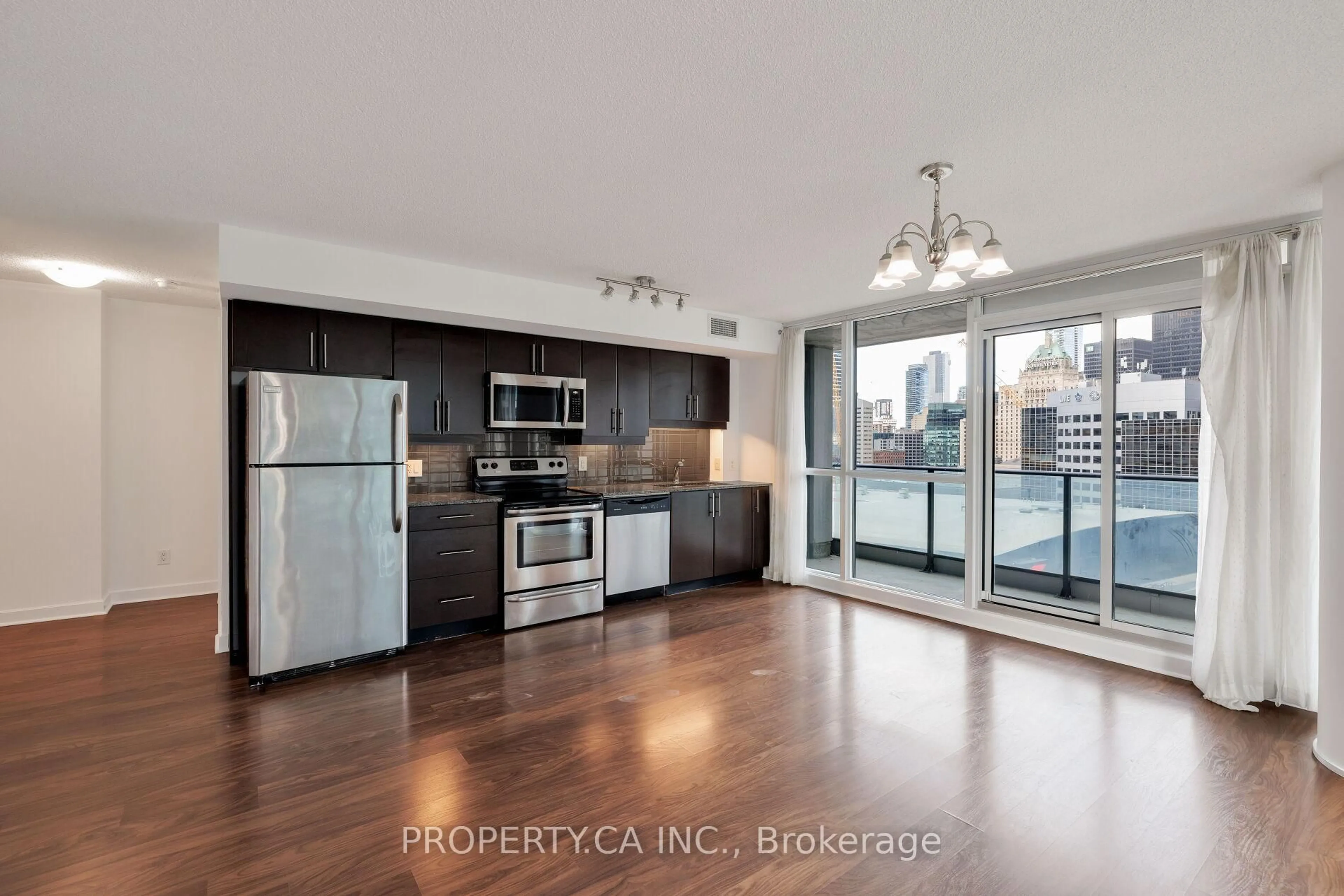 Open concept kitchen, wood/laminate floor for 33 Bay St #1604, Toronto Ontario M5J 2Z3