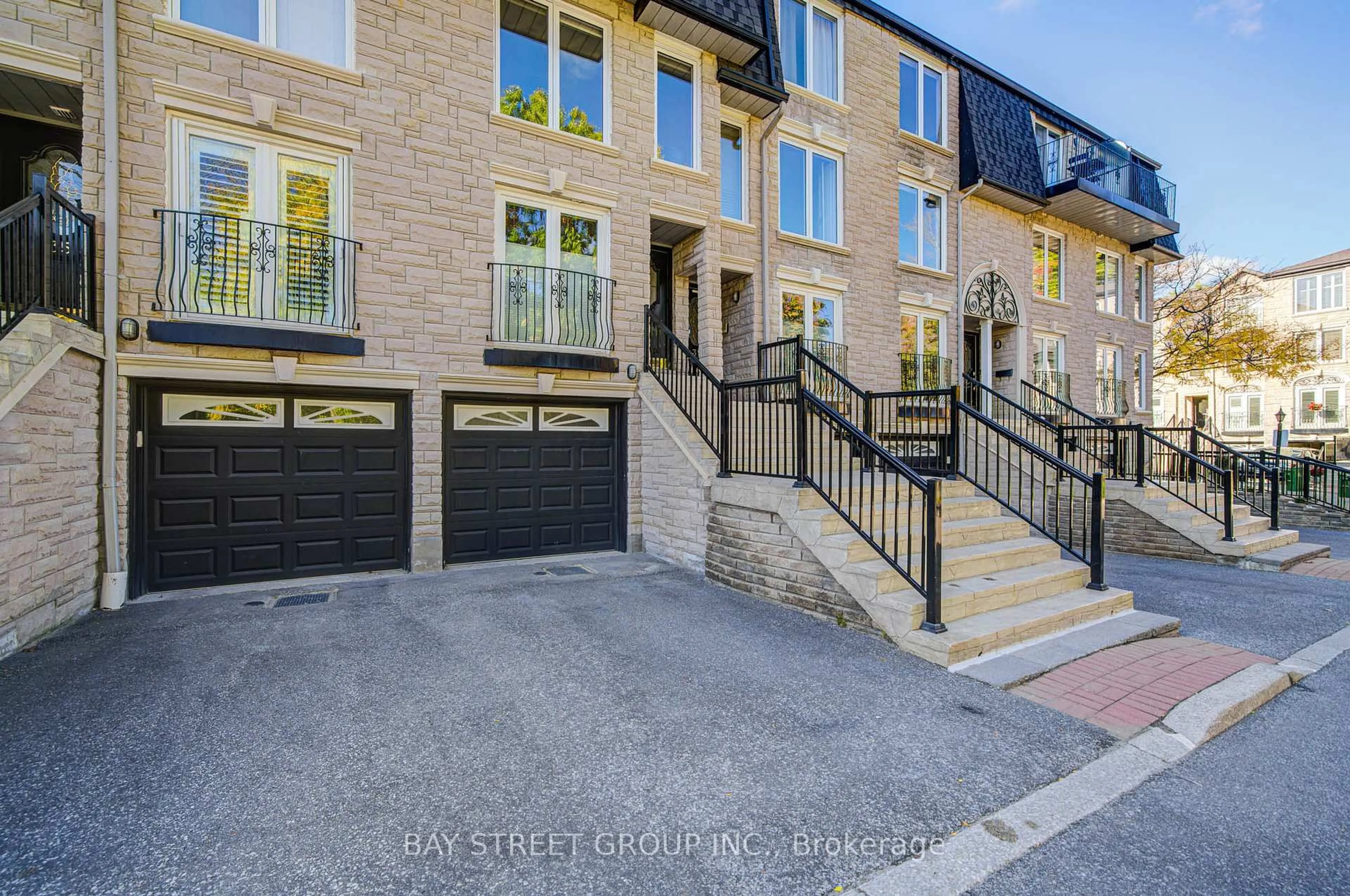Home with brick exterior material, street for 33 Birchbank Lane #3, Toronto Ontario M3B 2Y2