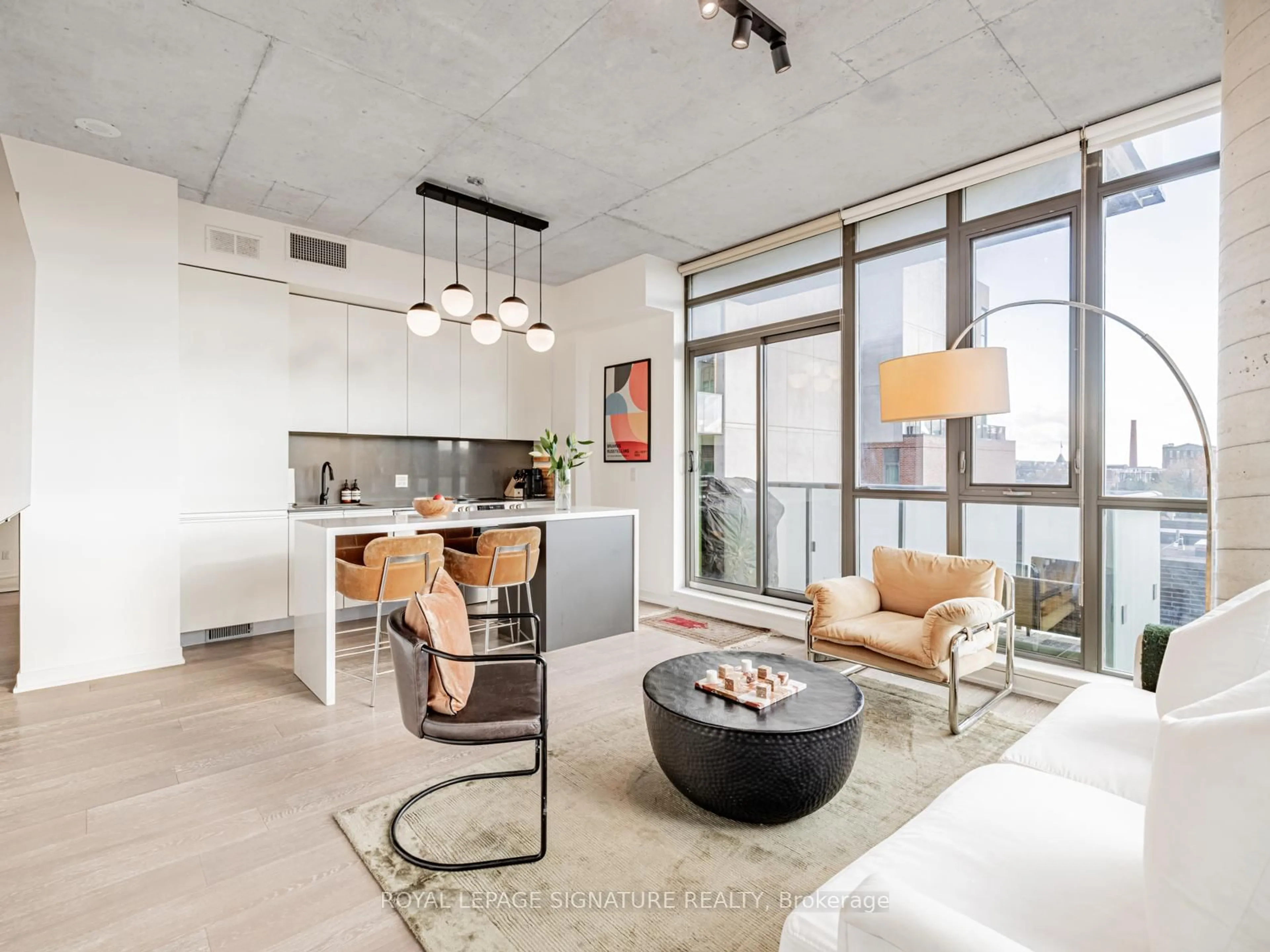 Open concept kitchen, cement floor for 8 Gladstone Ave #514, Toronto Ontario M6J 0B3