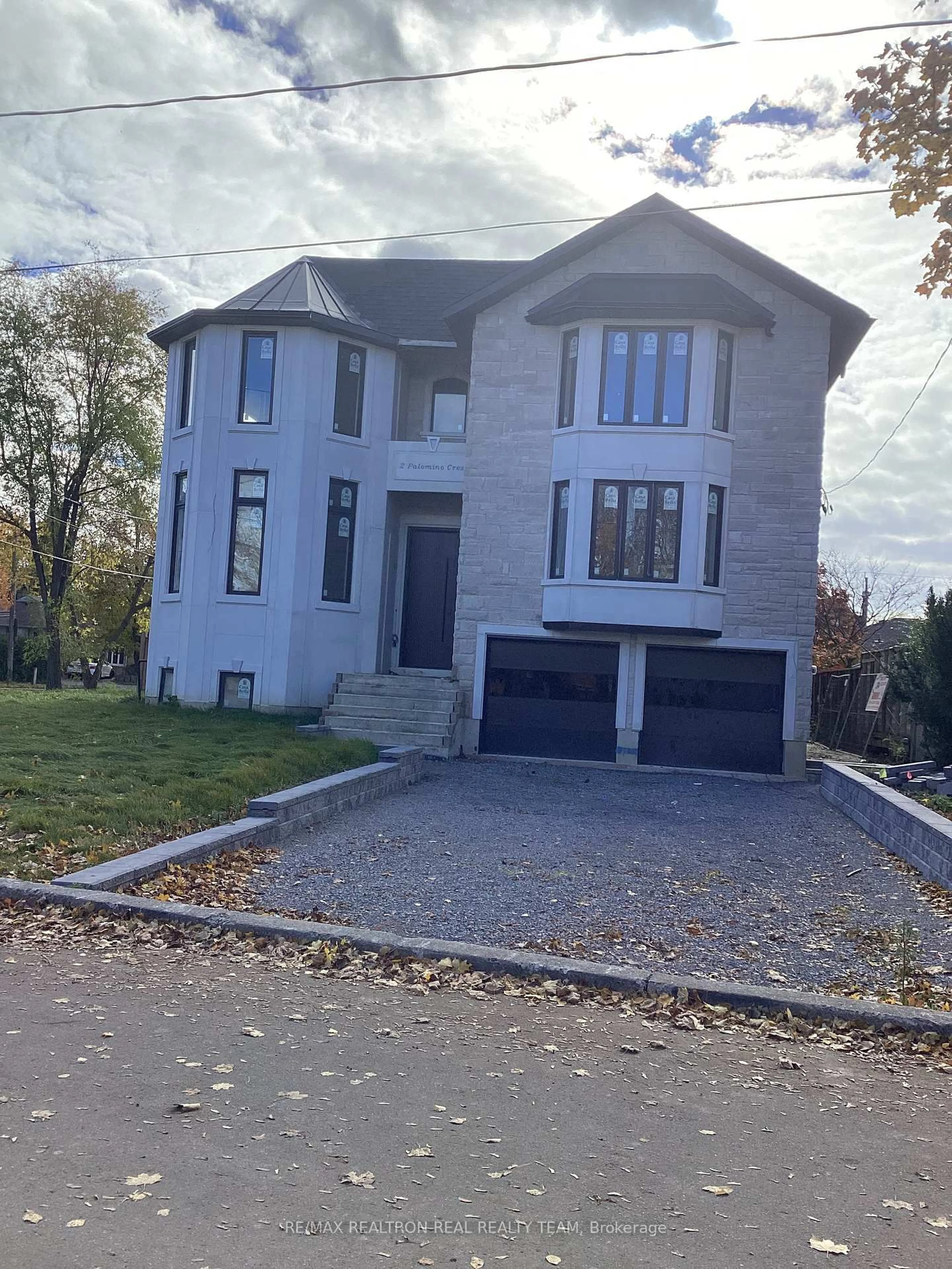Home with brick exterior material, street for 2 Palomino Cres, Toronto Ontario M2K 1W1