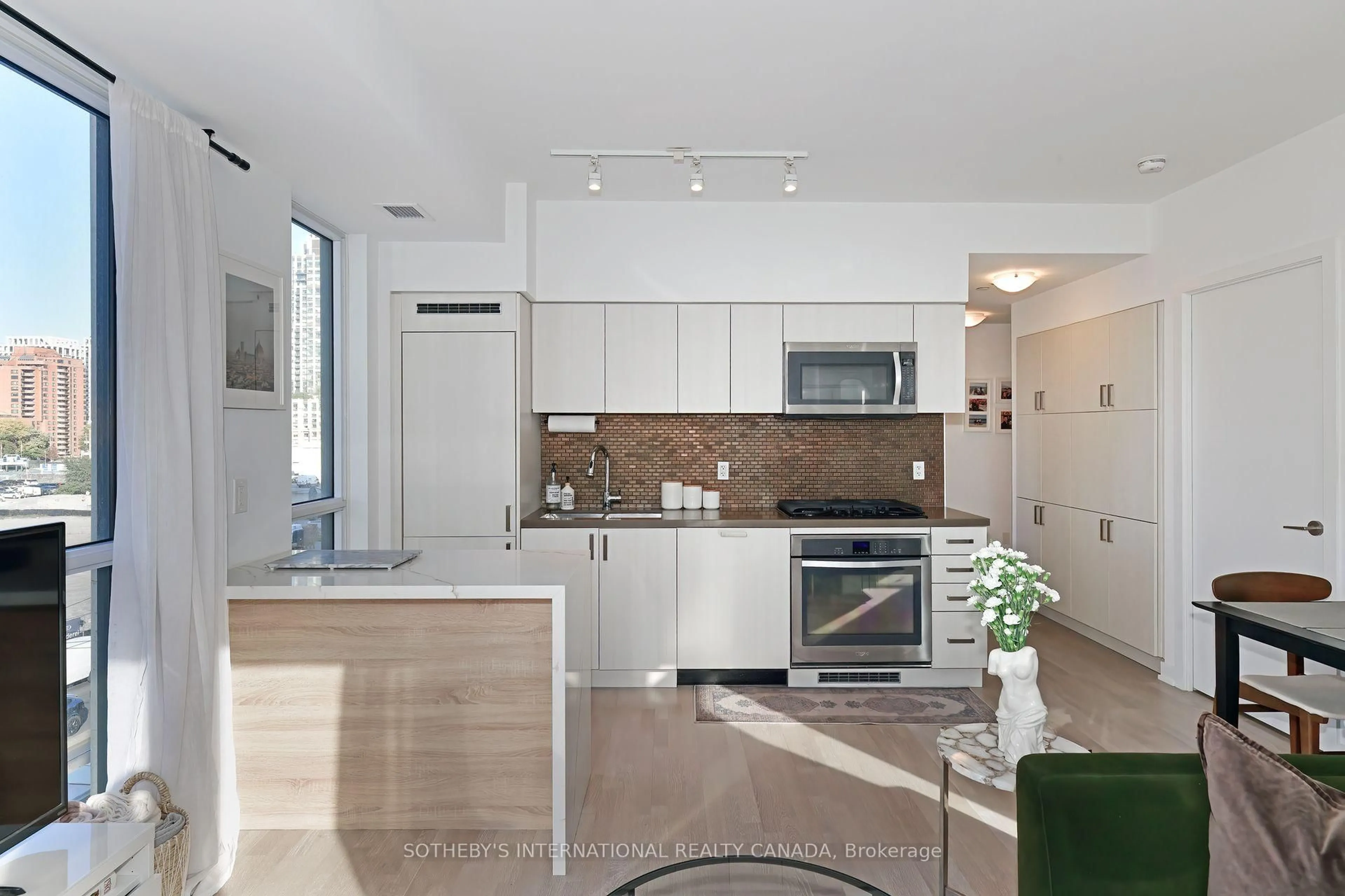 Open concept kitchen, ceramic/tile floor for 501 St Clair Ave #326, Toronto Ontario M5P 0A2