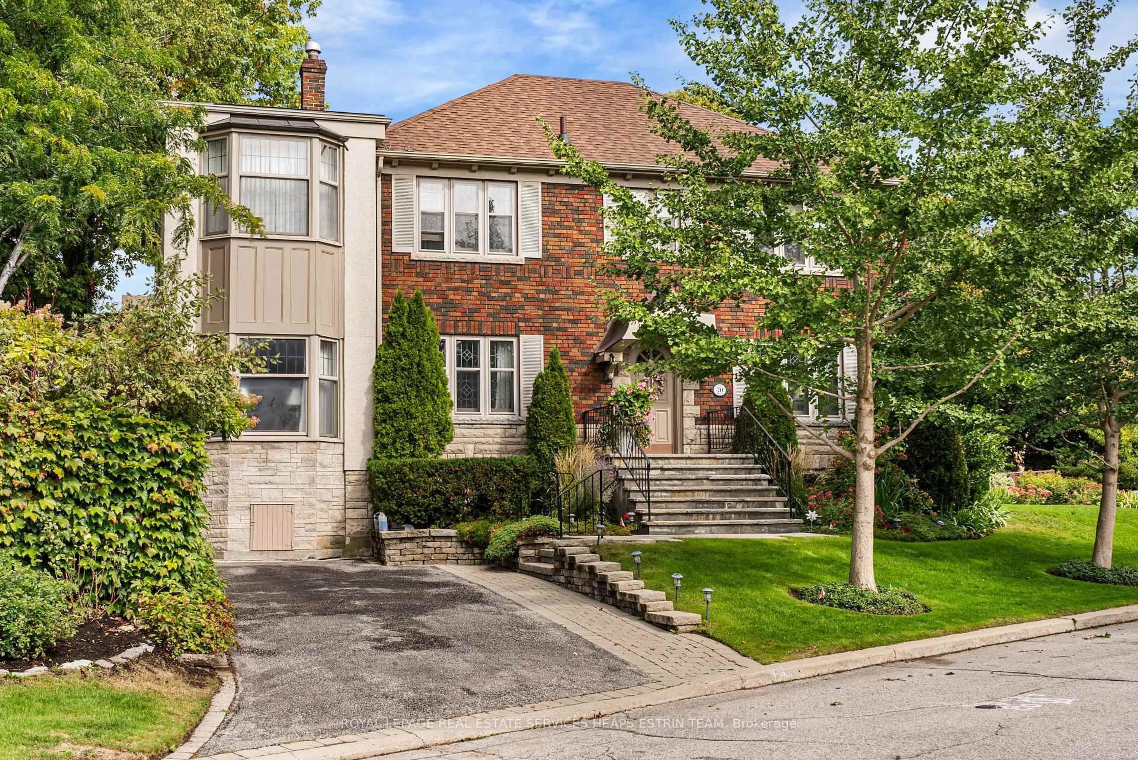 Home with brick exterior material, street for 70 Bessborough Dr, Toronto Ontario M4G 3J1