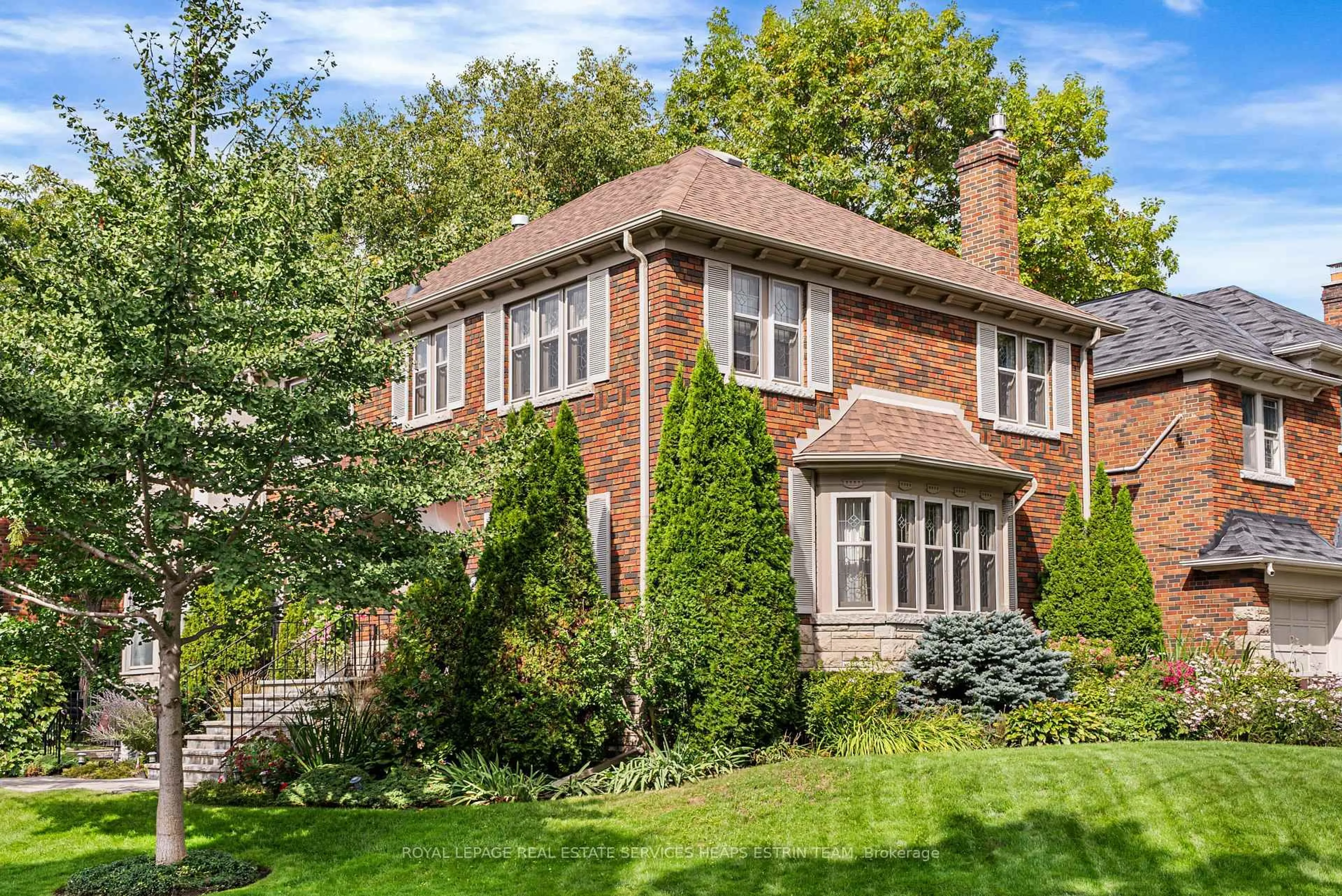 Home with brick exterior material, street for 70 Bessborough Dr, Toronto Ontario M4G 3J1