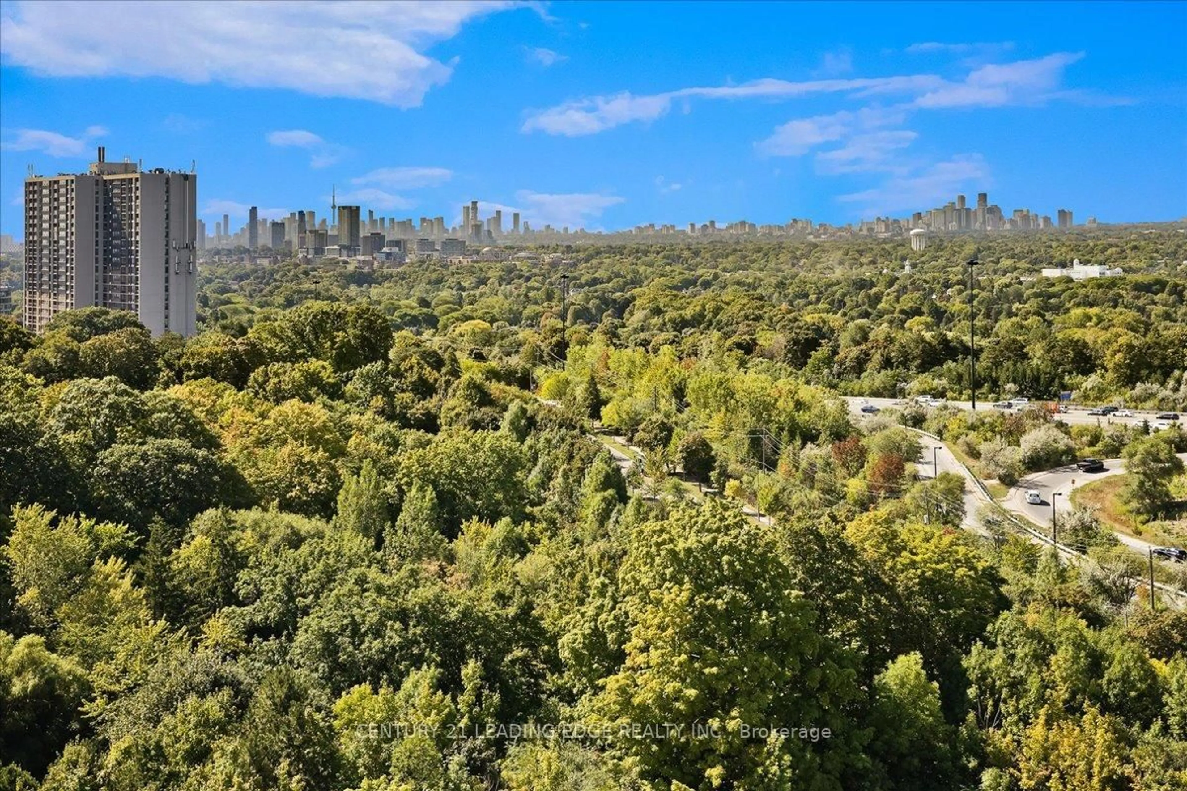 A pic from outside/outdoor area/front of a property/back of a property/a pic from drone, forest/trees view for 10 DEERLICK Crt #1401, Toronto Ontario M3A 0A7