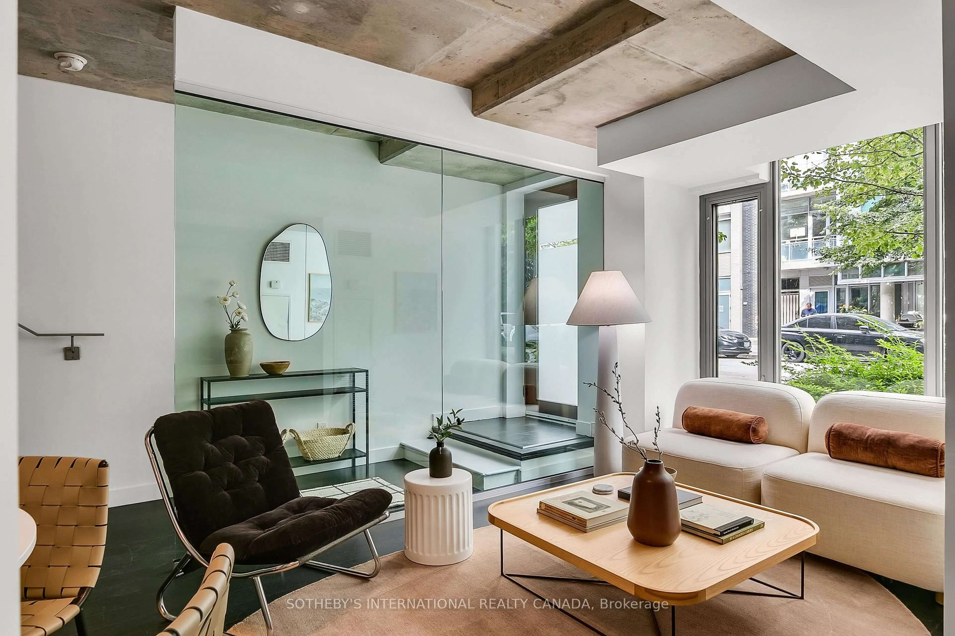 Living room with furniture, cement floor for 55 Stewart St #113, Toronto Ontario M5V 2V1