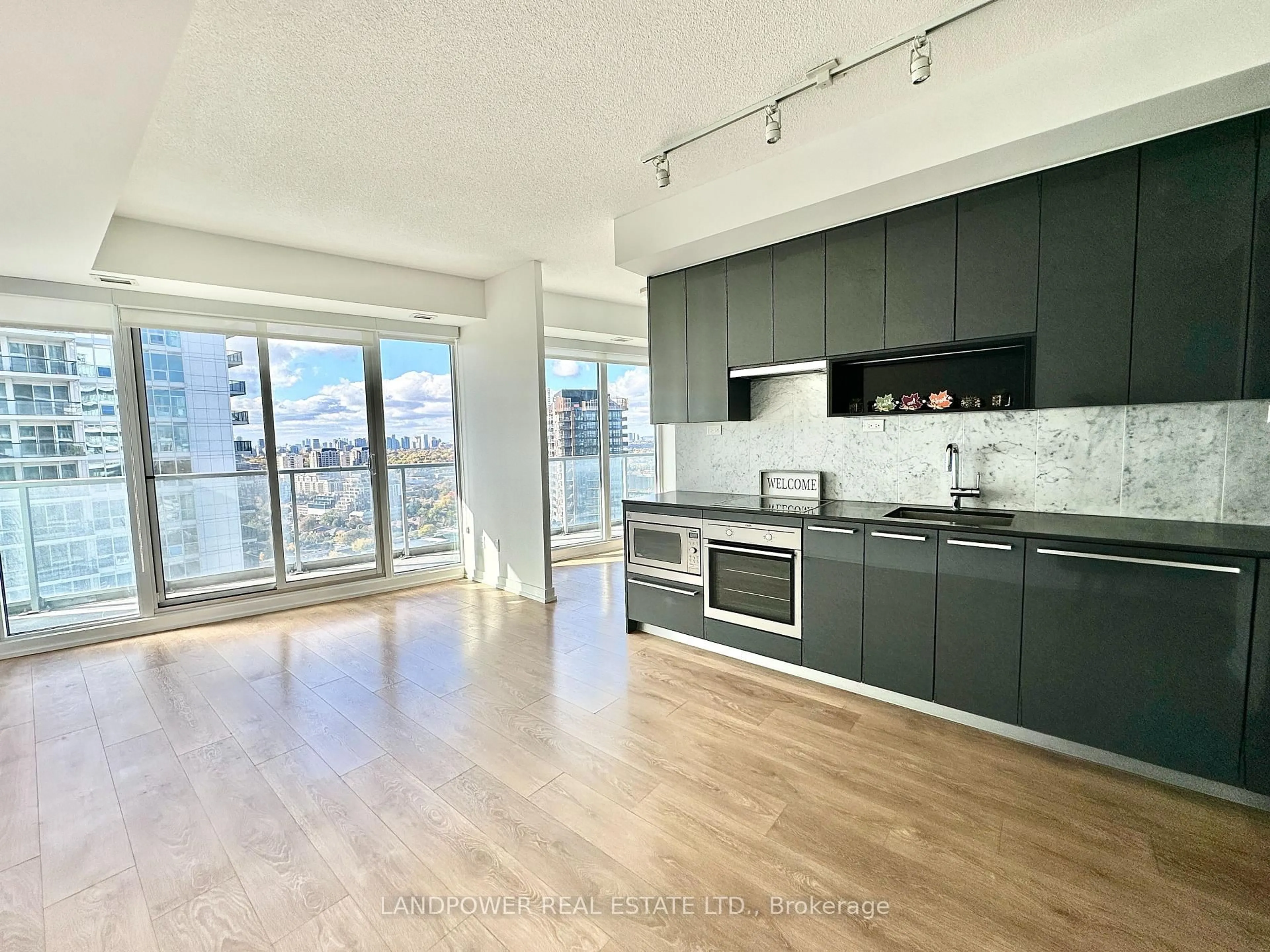 Open concept kitchen, wood/laminate floor for 115 McMahon Dr #3502, Toronto Ontario M2K 0E3