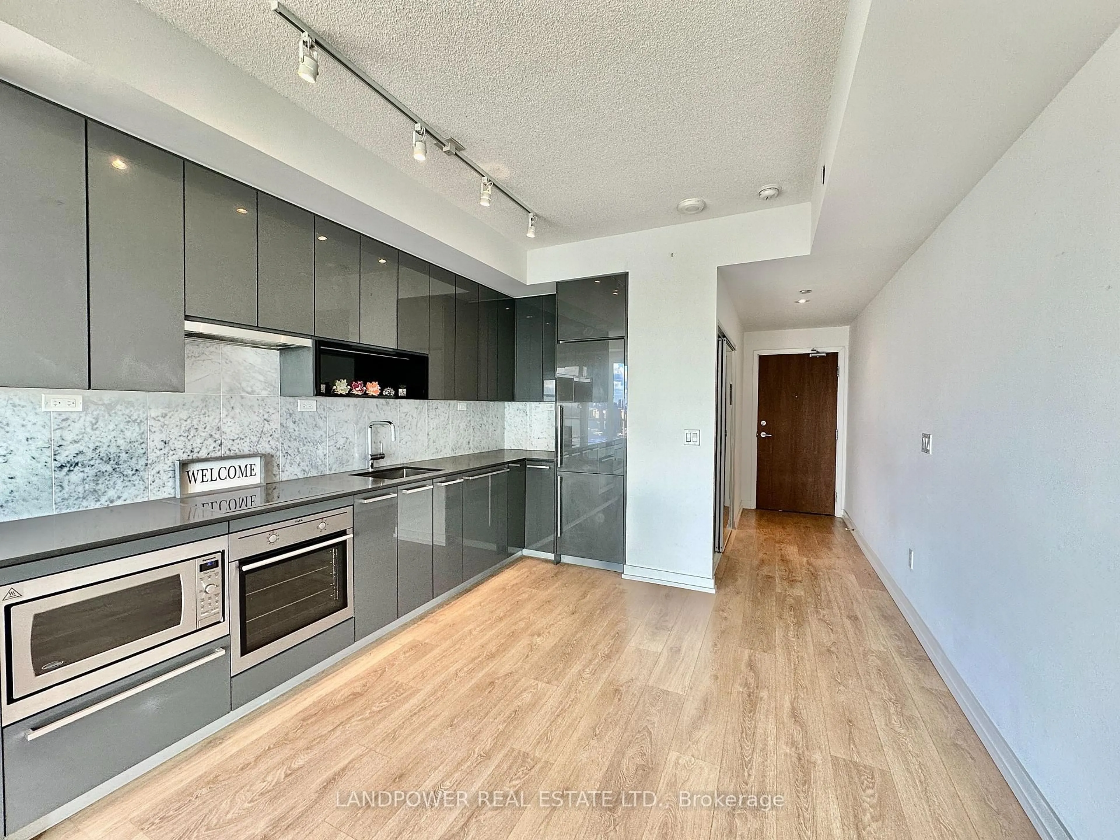 Open concept kitchen, wood/laminate floor for 115 McMahon Dr #3502, Toronto Ontario M2K 0E3
