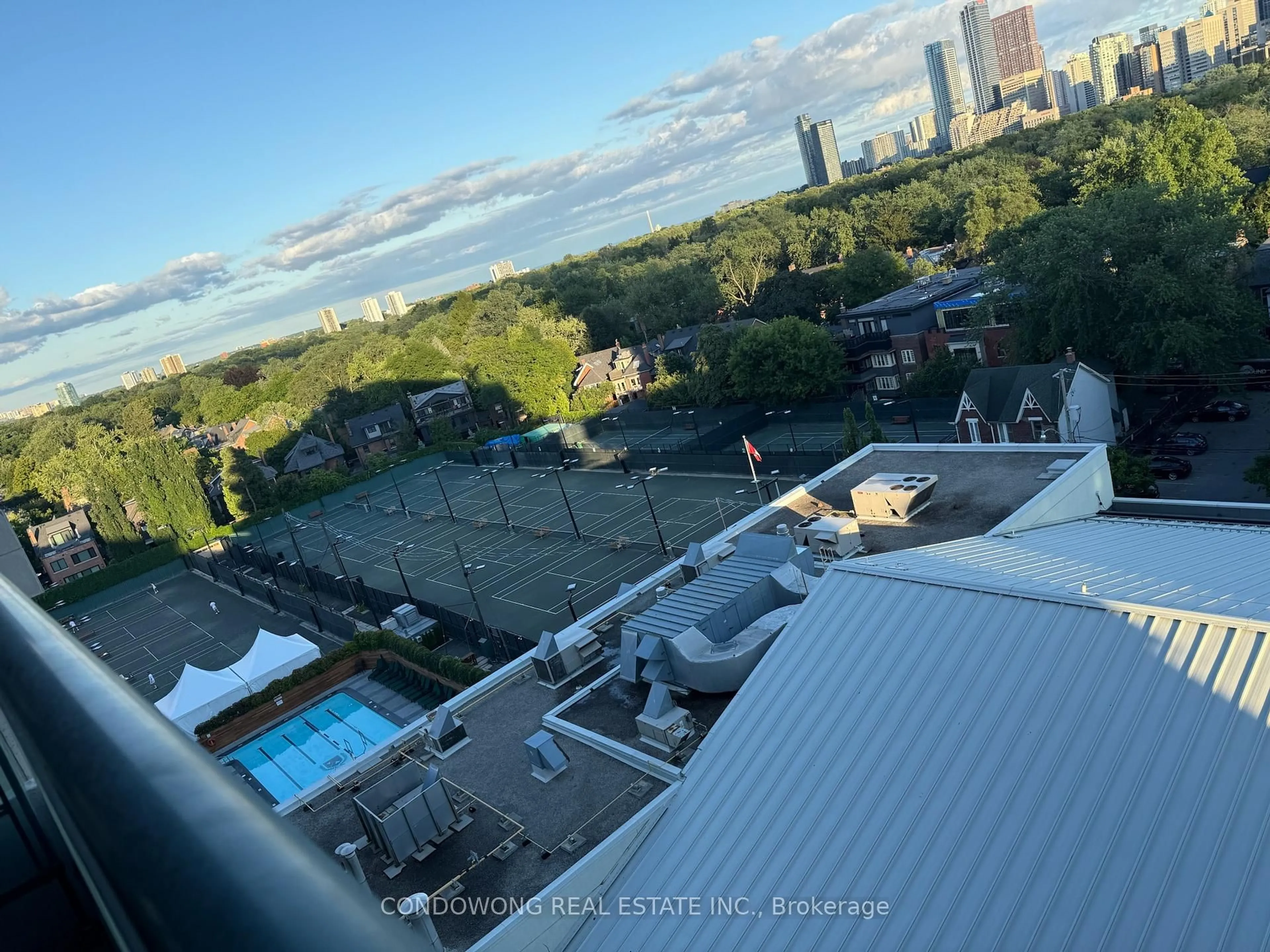 A pic from outside/outdoor area/front of a property/back of a property/a pic from drone, city buildings view from balcony for 25 Scrivener Sq #906, Toronto Ontario M4W 3Y6