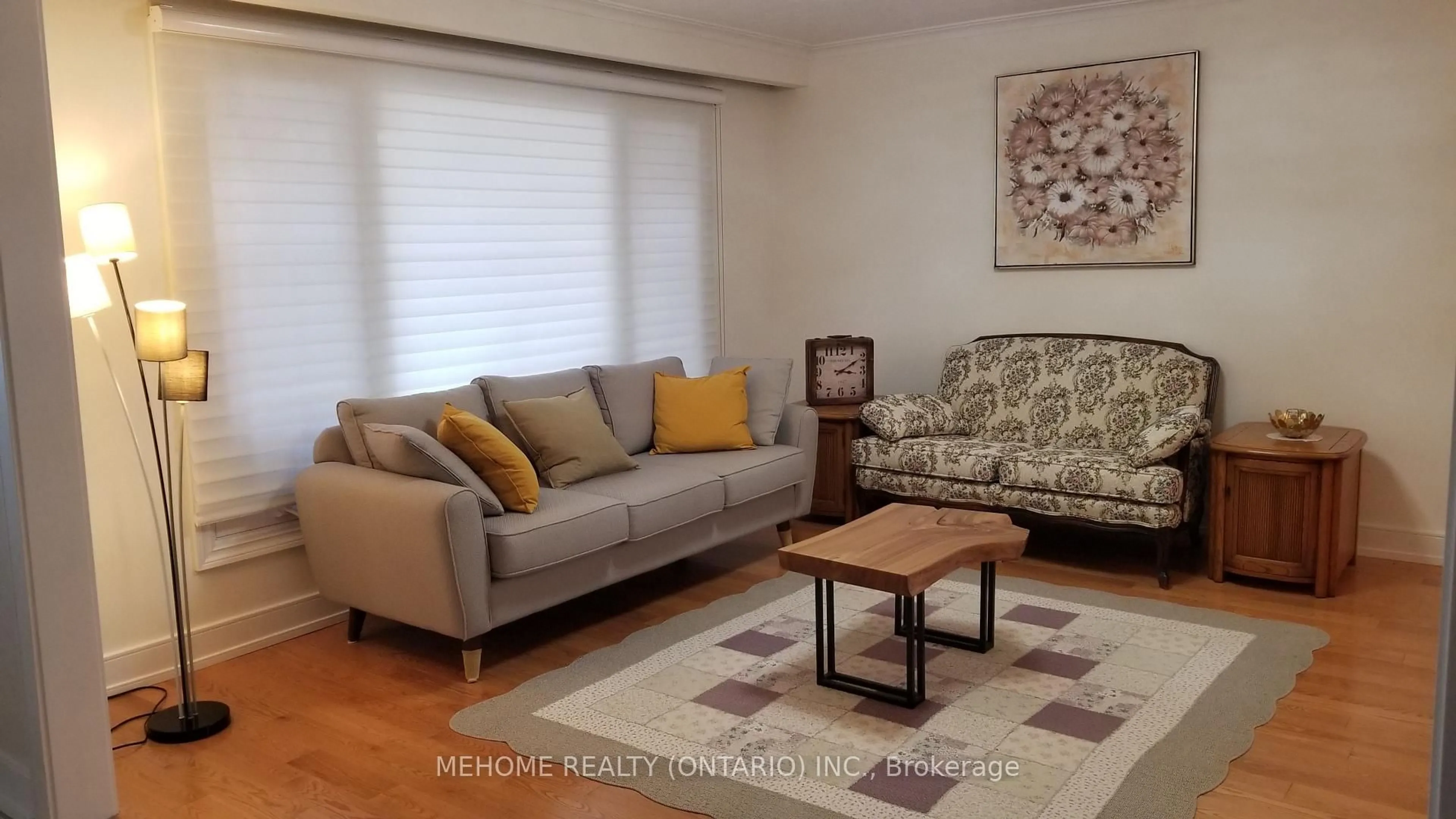 Living room with furniture, wood/laminate floor for 55 Adamede Cres, Toronto Ontario M2H 1B6