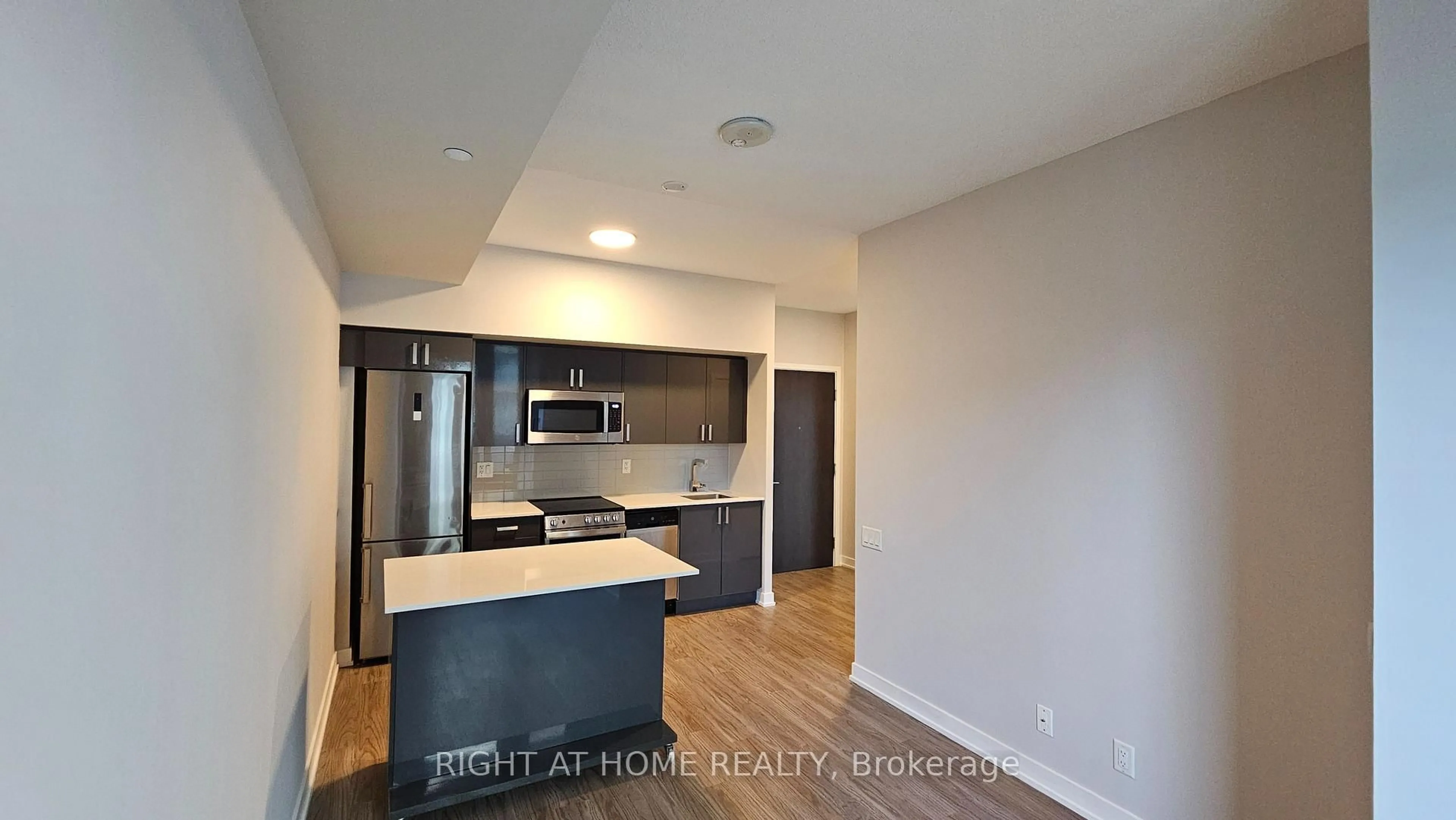 Open concept kitchen, unknown for 38 Monte Kwinter Crt #728, Toronto Ontario M3H 0E2