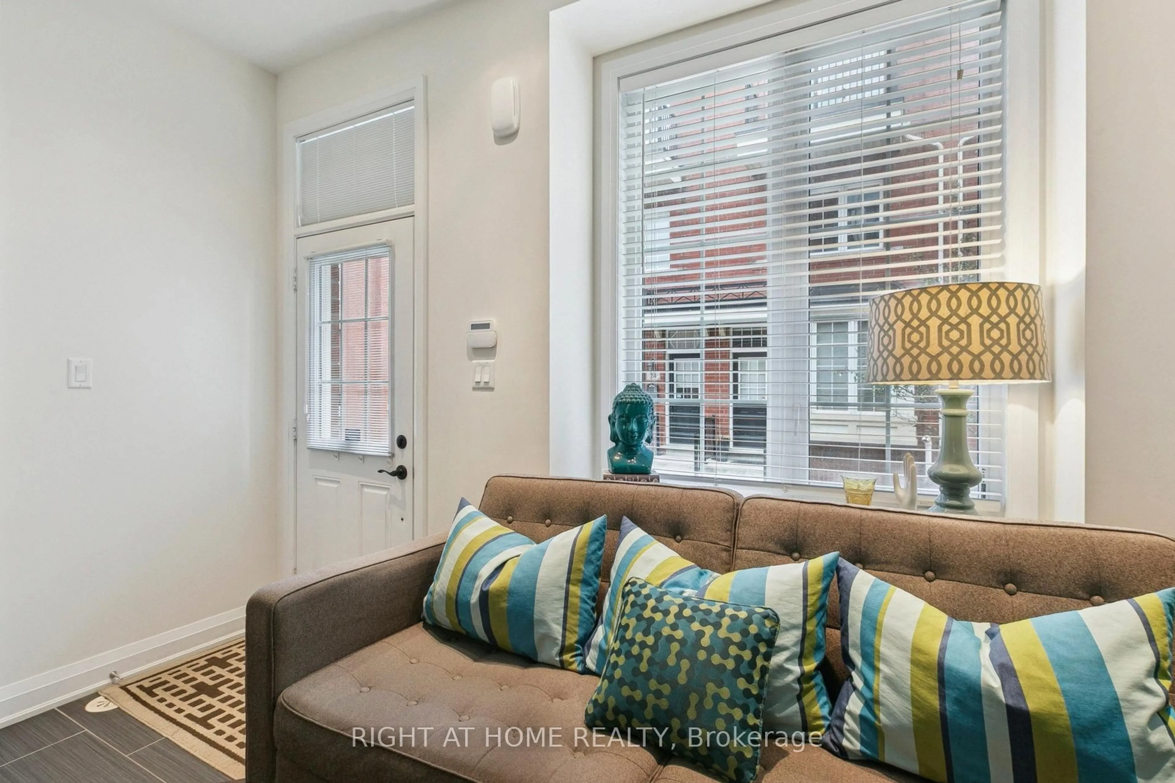 Living room with furniture, unknown for 28 Raffeix Lane, Toronto Ontario M5A 0G5