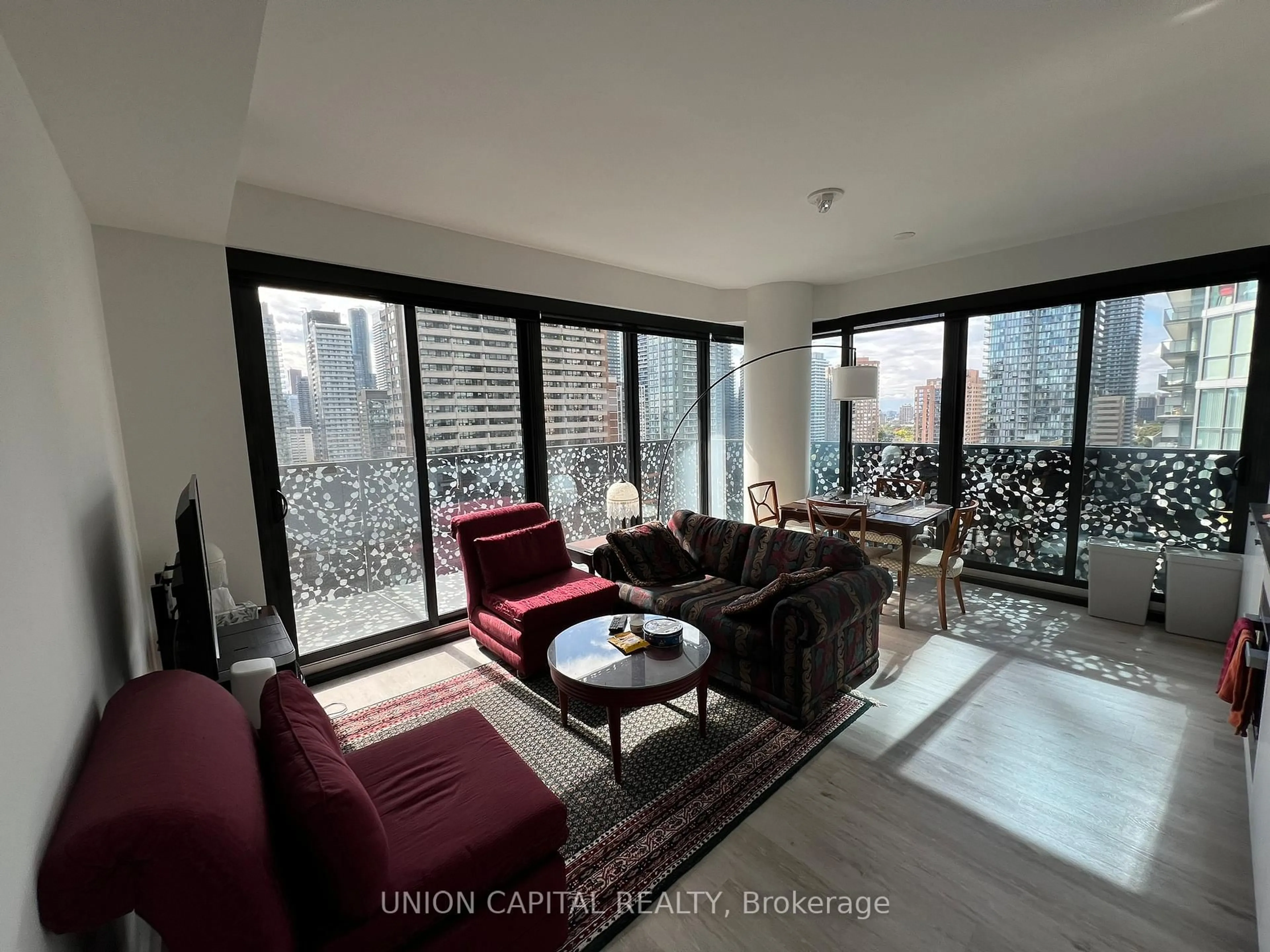 Living room with furniture, carpet floor for 55 Charles St #1406, Toronto Ontario M4Y 0J1