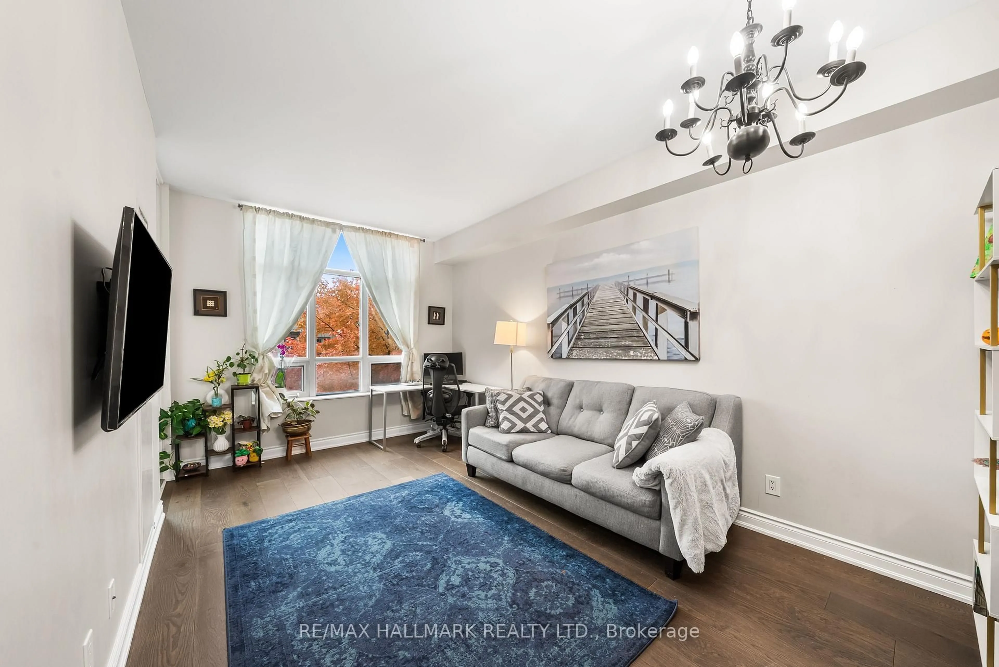 Living room with furniture, unknown for 20 Bloorview Pl #311, Toronto Ontario M2J 0A6