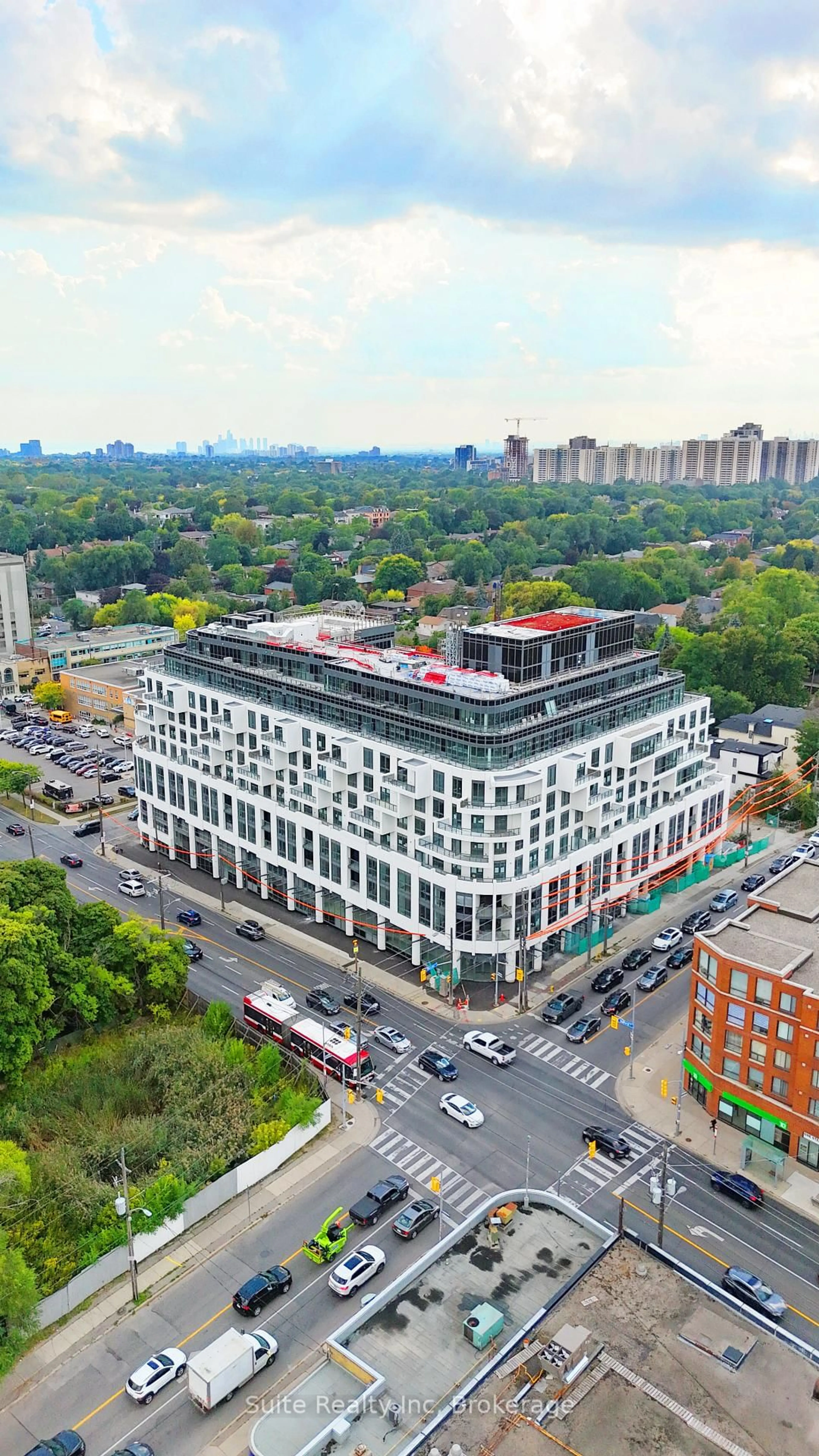 A pic from outside/outdoor area/front of a property/back of a property/a pic from drone, building for 505 Glencairn Ave #406, Toronto Ontario M6B 0B2