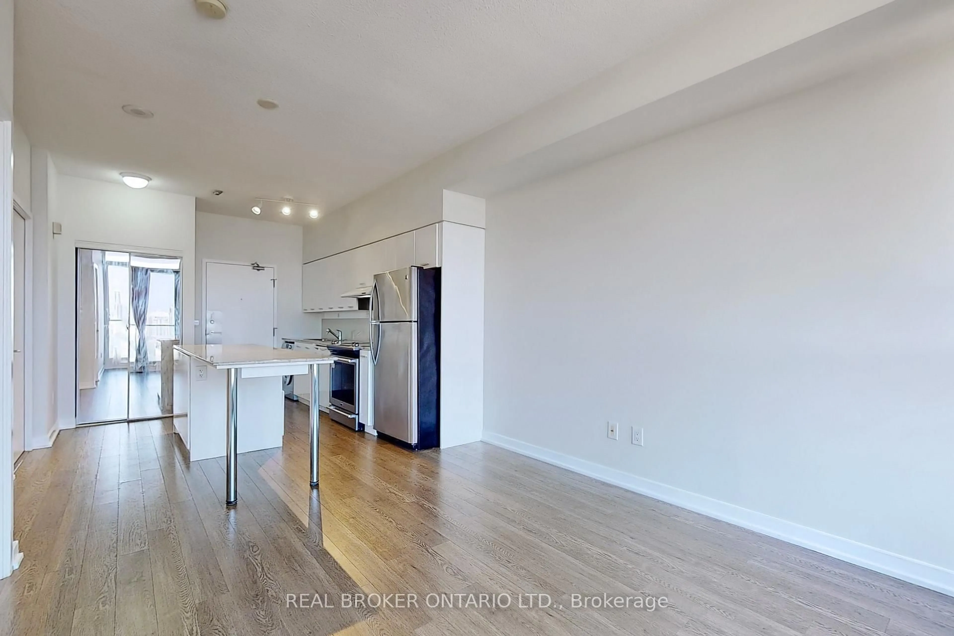 Open concept kitchen, wood/laminate floor for 33 Singer Crt #2906, Toronto Ontario M2K 0B4