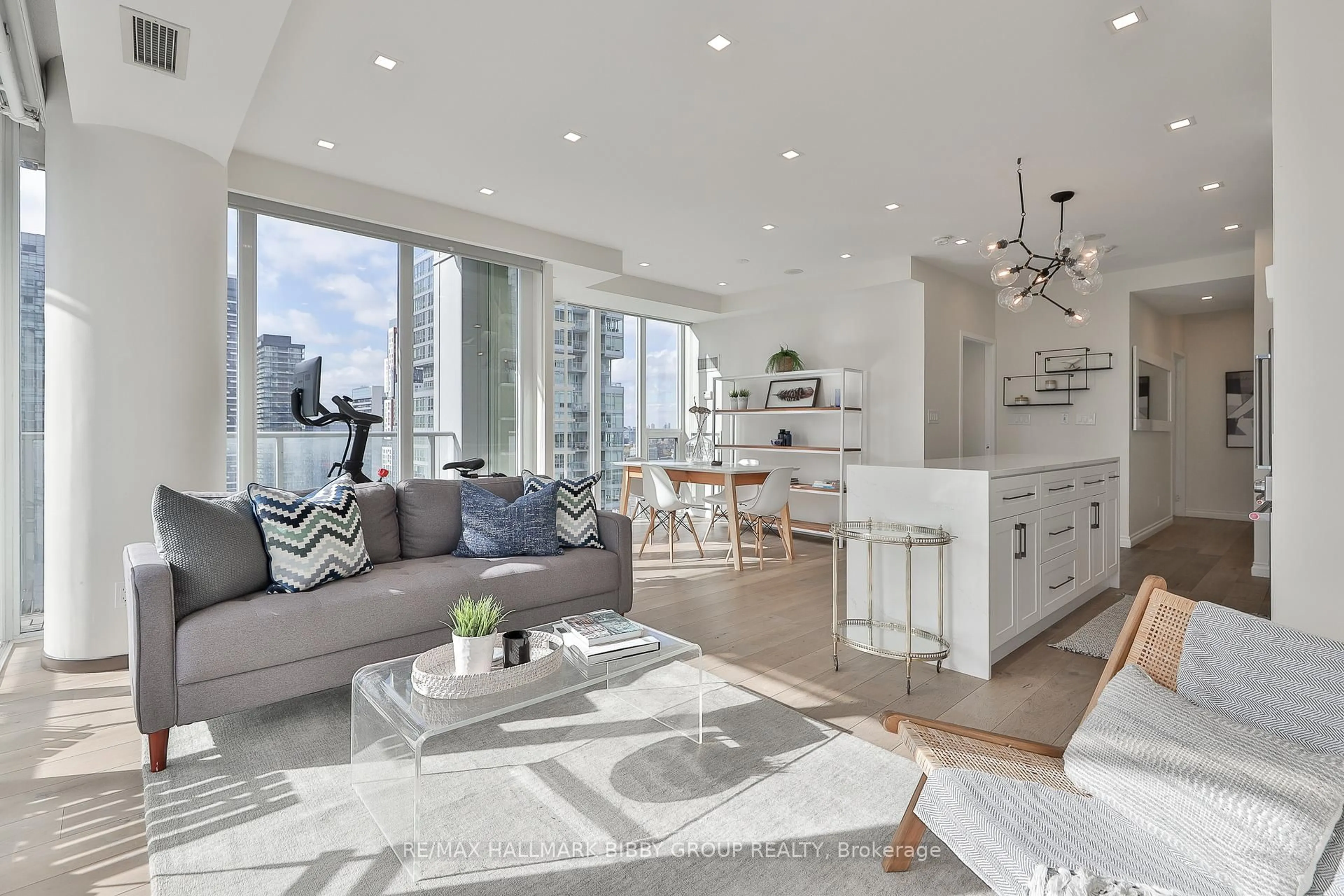 Living room with furniture, unknown for 126 Simcoe St #2303, Toronto Ontario M5H 4E6