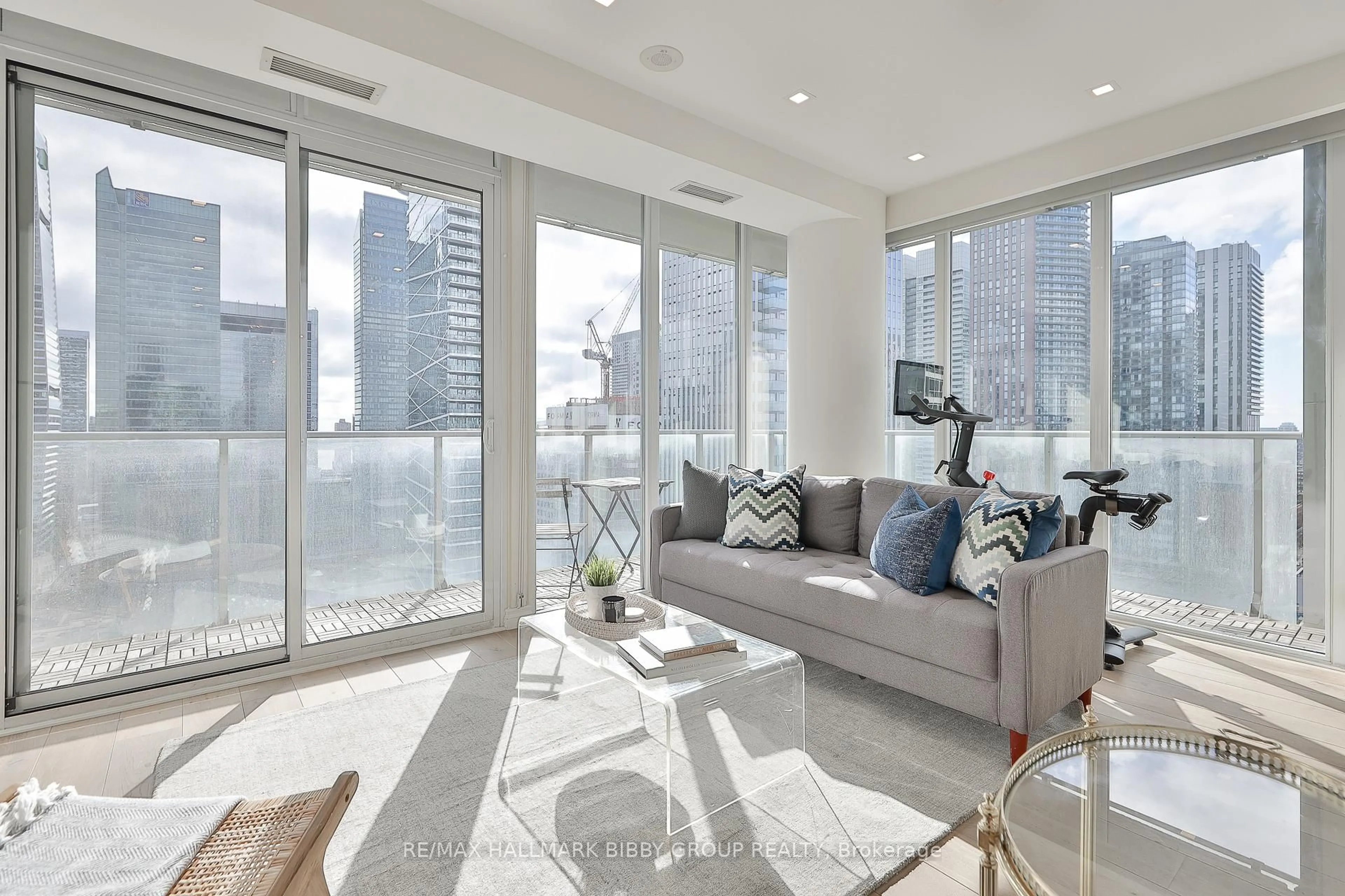 Living room with furniture, unknown for 126 Simcoe St #2303, Toronto Ontario M5H 4E6