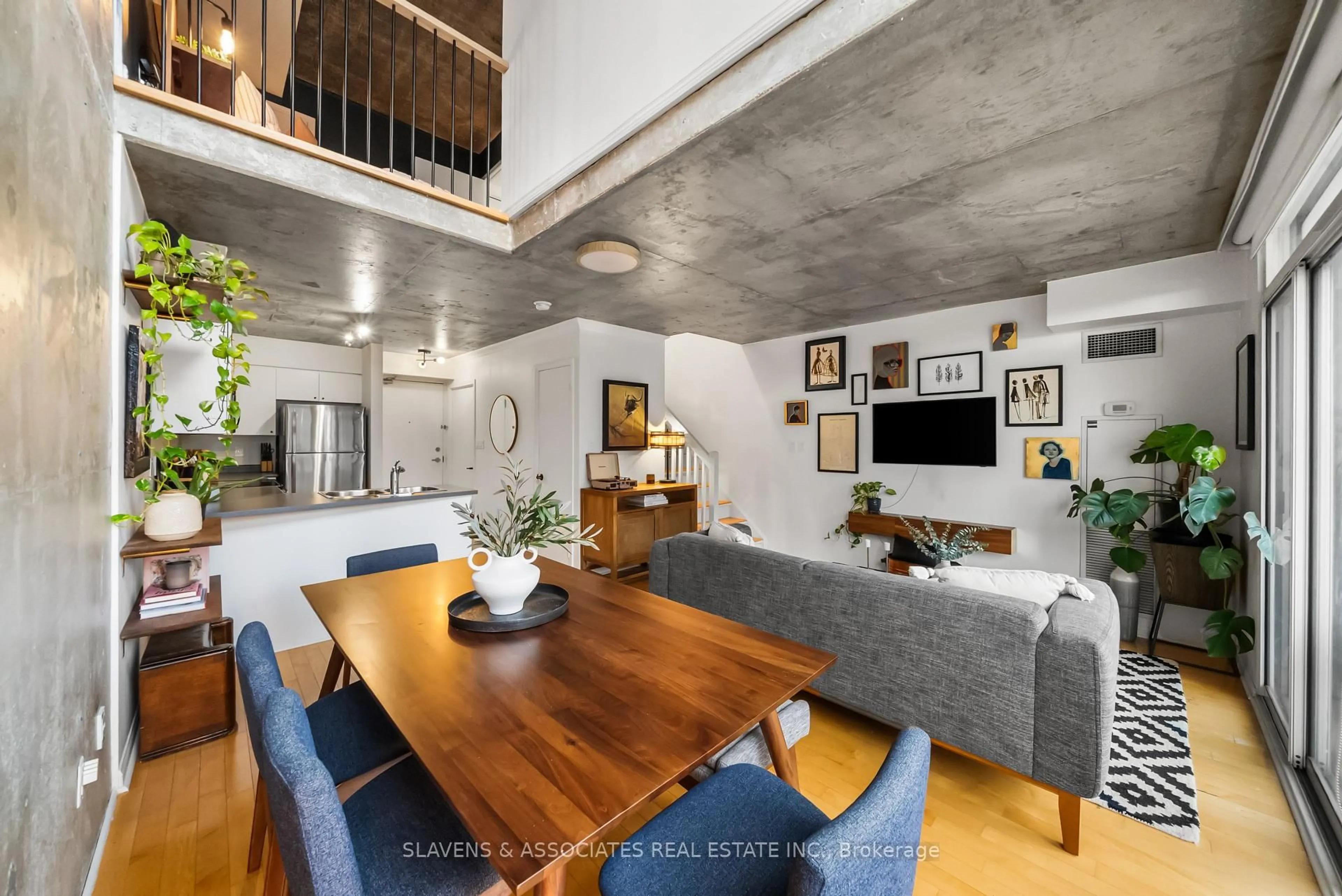 Open concept kitchen, cement floor for 1029 King St #805, Toronto Ontario M6K 3M9