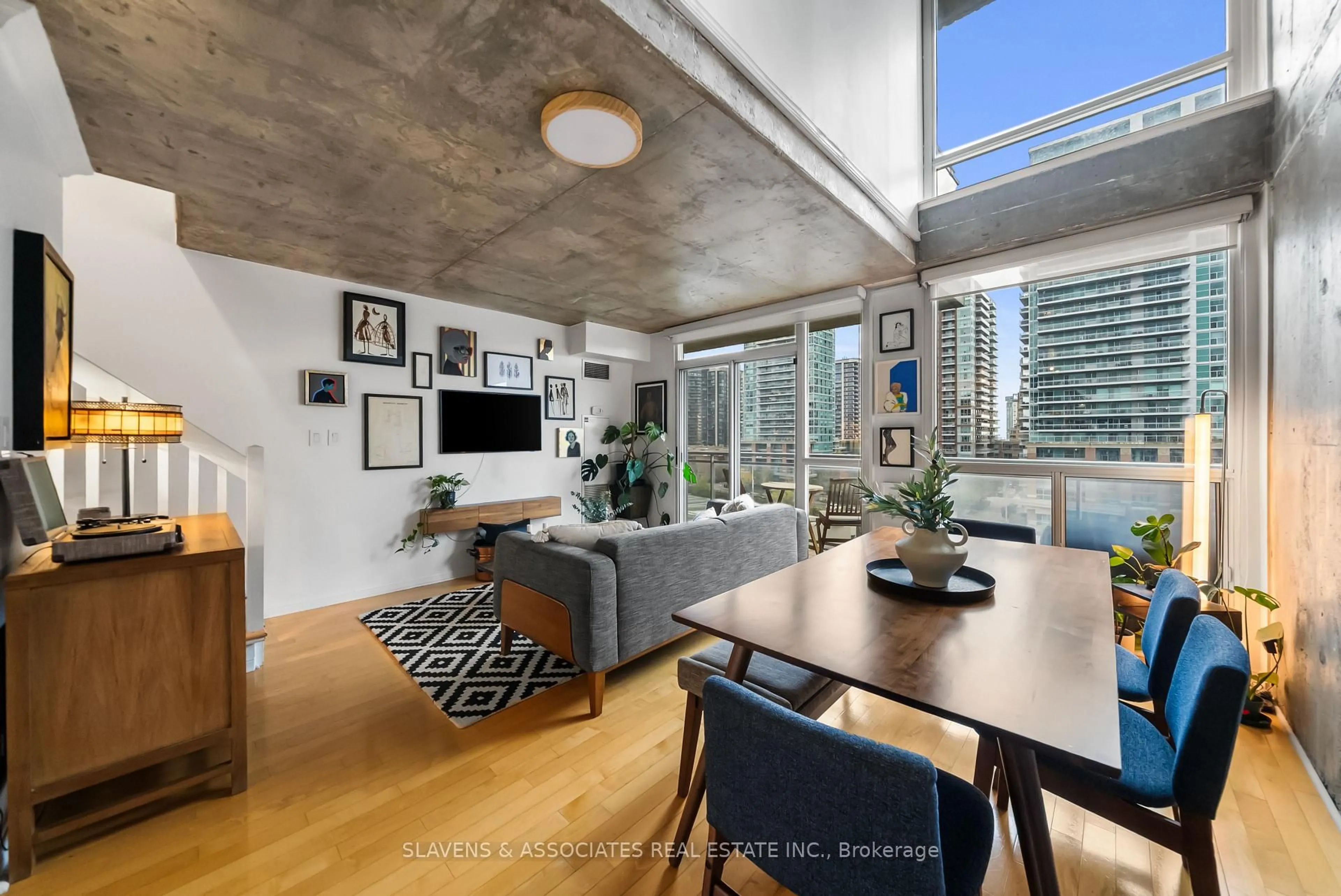 Living room with furniture, cement floor for 1029 King St #805, Toronto Ontario M6K 3M9