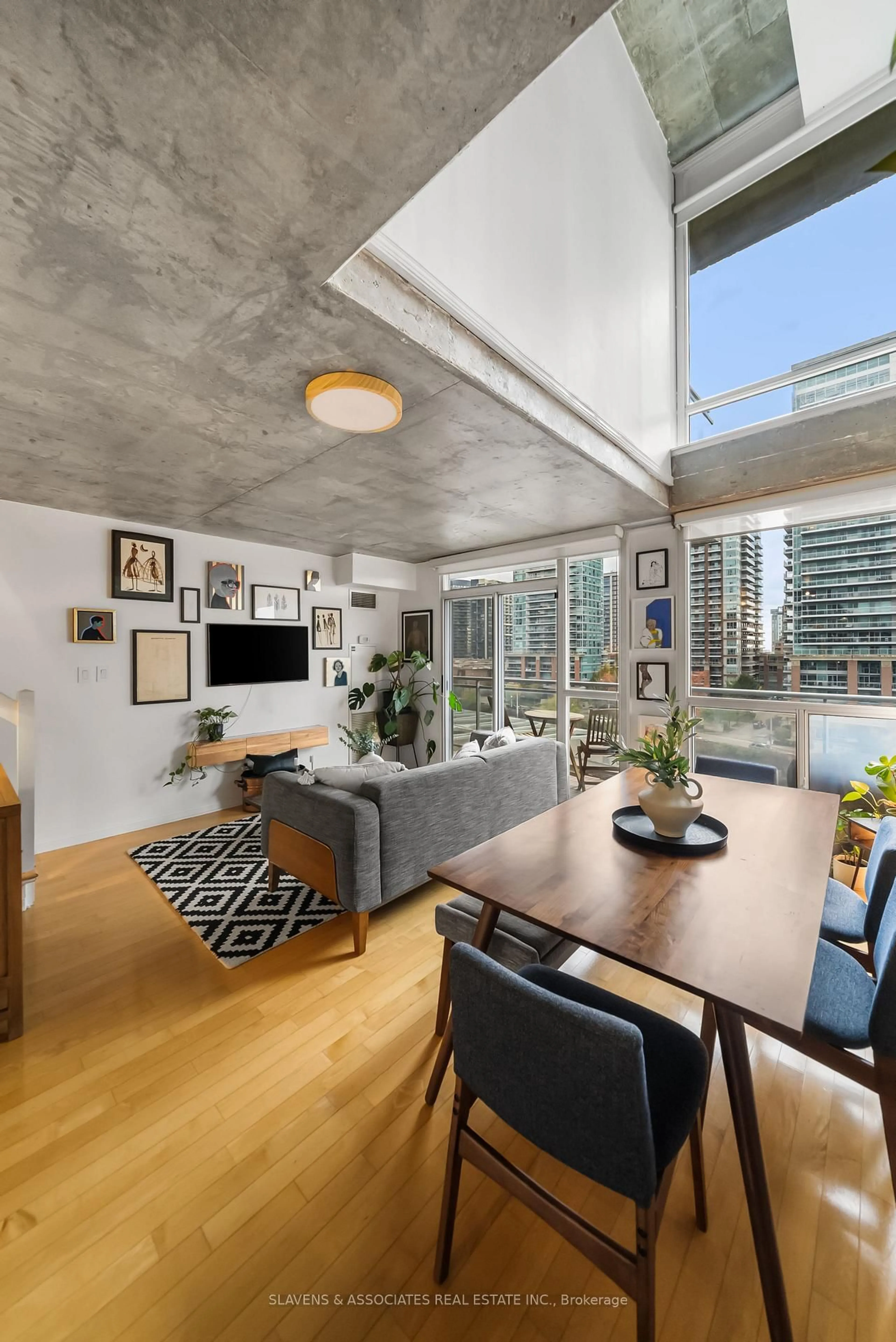 Living room with furniture, cement floor for 1029 King St #805, Toronto Ontario M6K 3M9