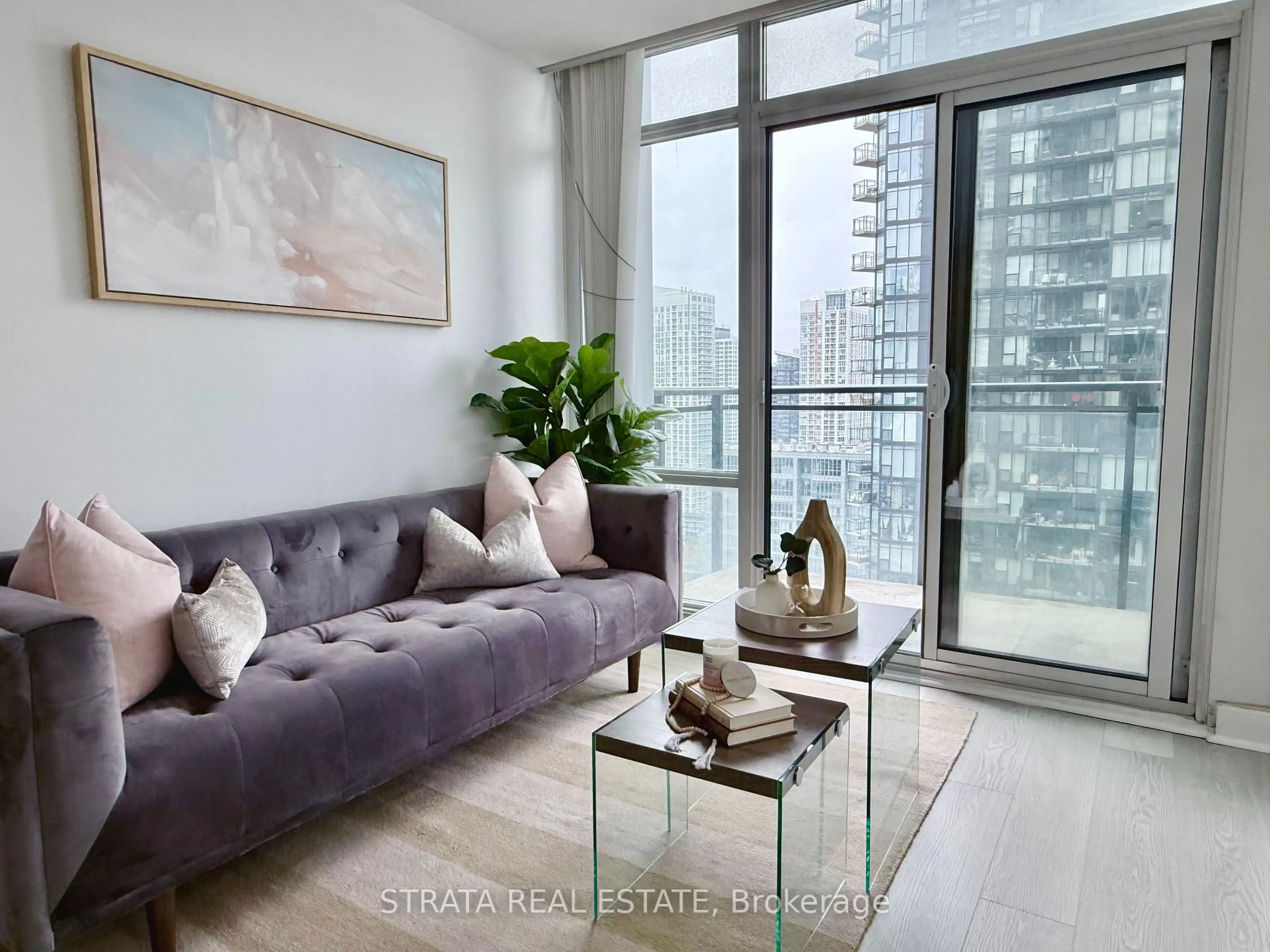 Living room with furniture, unknown for 25 Telegram Mews #3012, Toronto Ontario M5V 3Z1