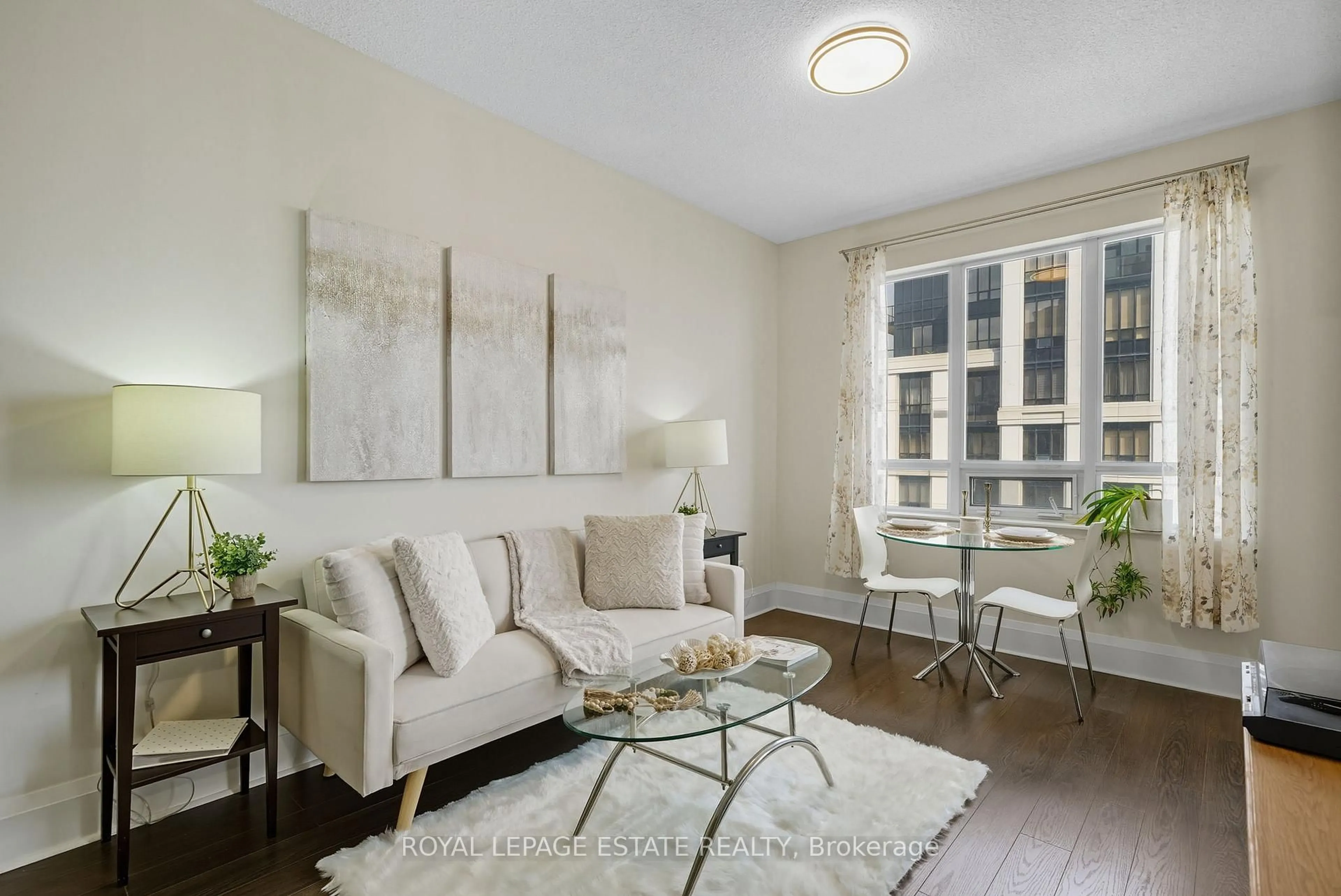 Living room with furniture, wood/laminate floor for 100 Harrison Garden Blvd #1808, Toronto Ontario M2N 0C2