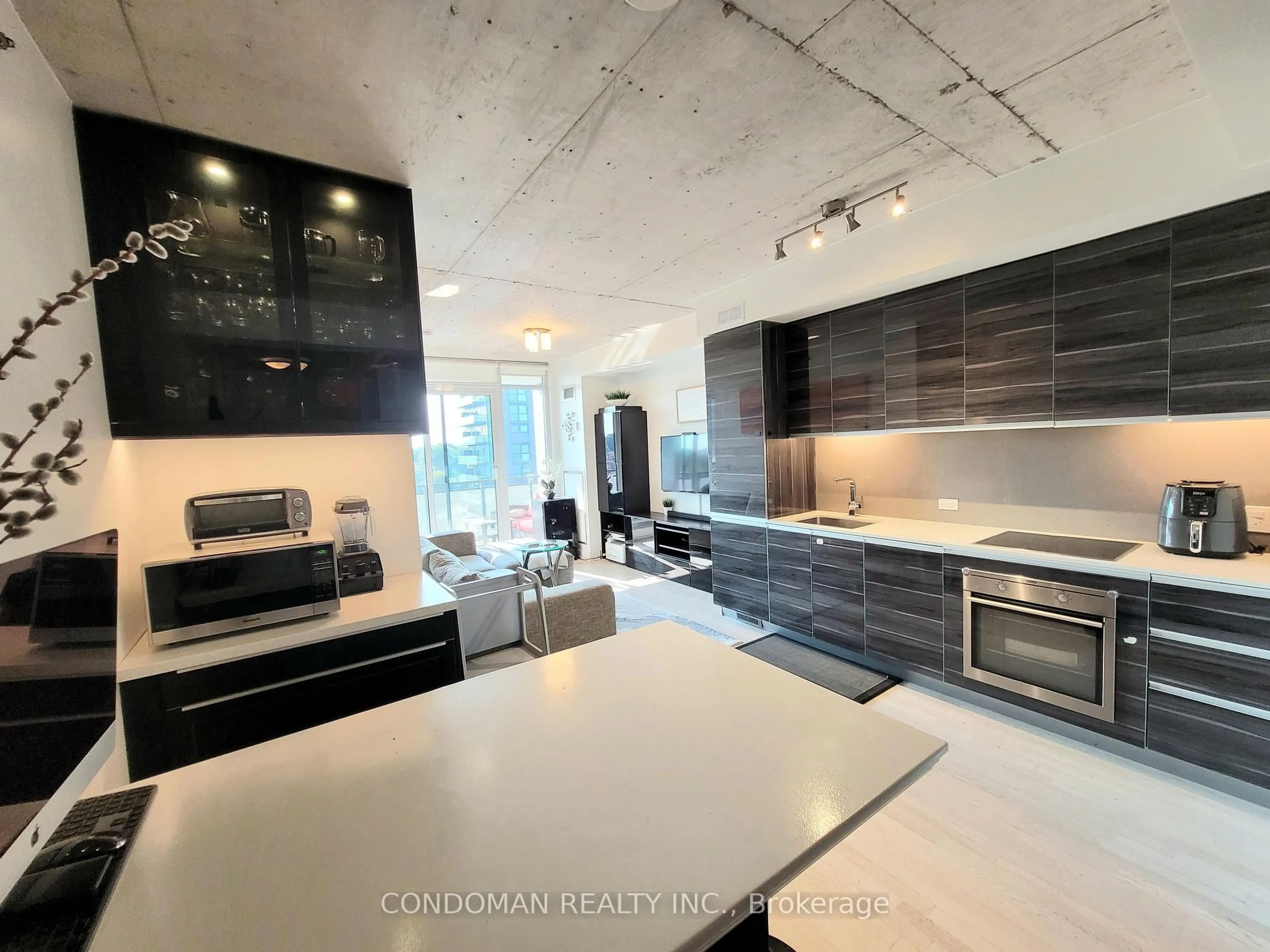 Open concept kitchen, unknown for 20 Minowan Miikan Lane #618, Toronto Ontario M6J 0E5