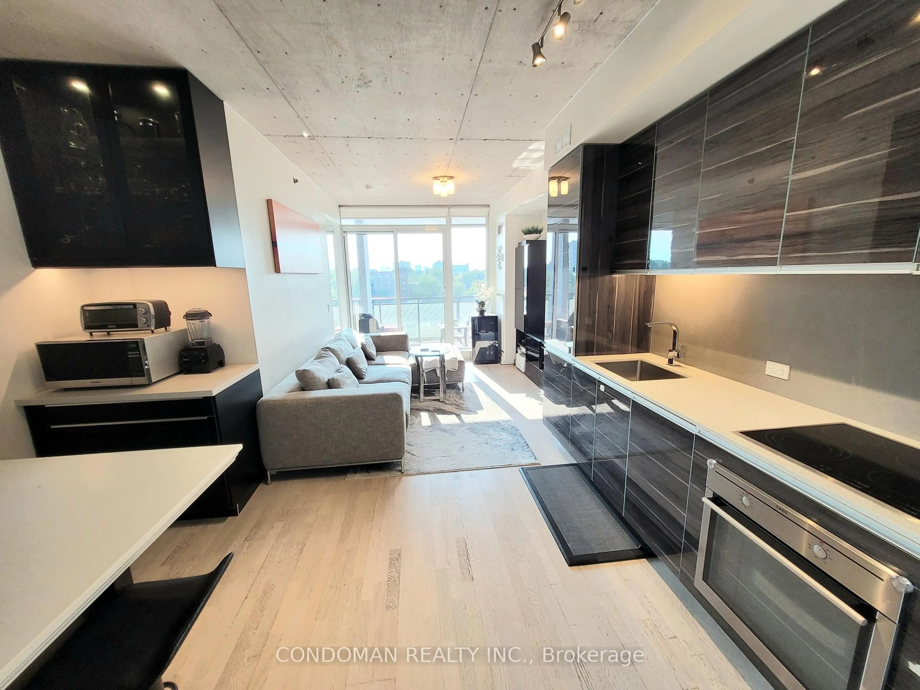 Open concept kitchen, unknown for 20 Minowan Miikan Lane #618, Toronto Ontario M6J 0E5