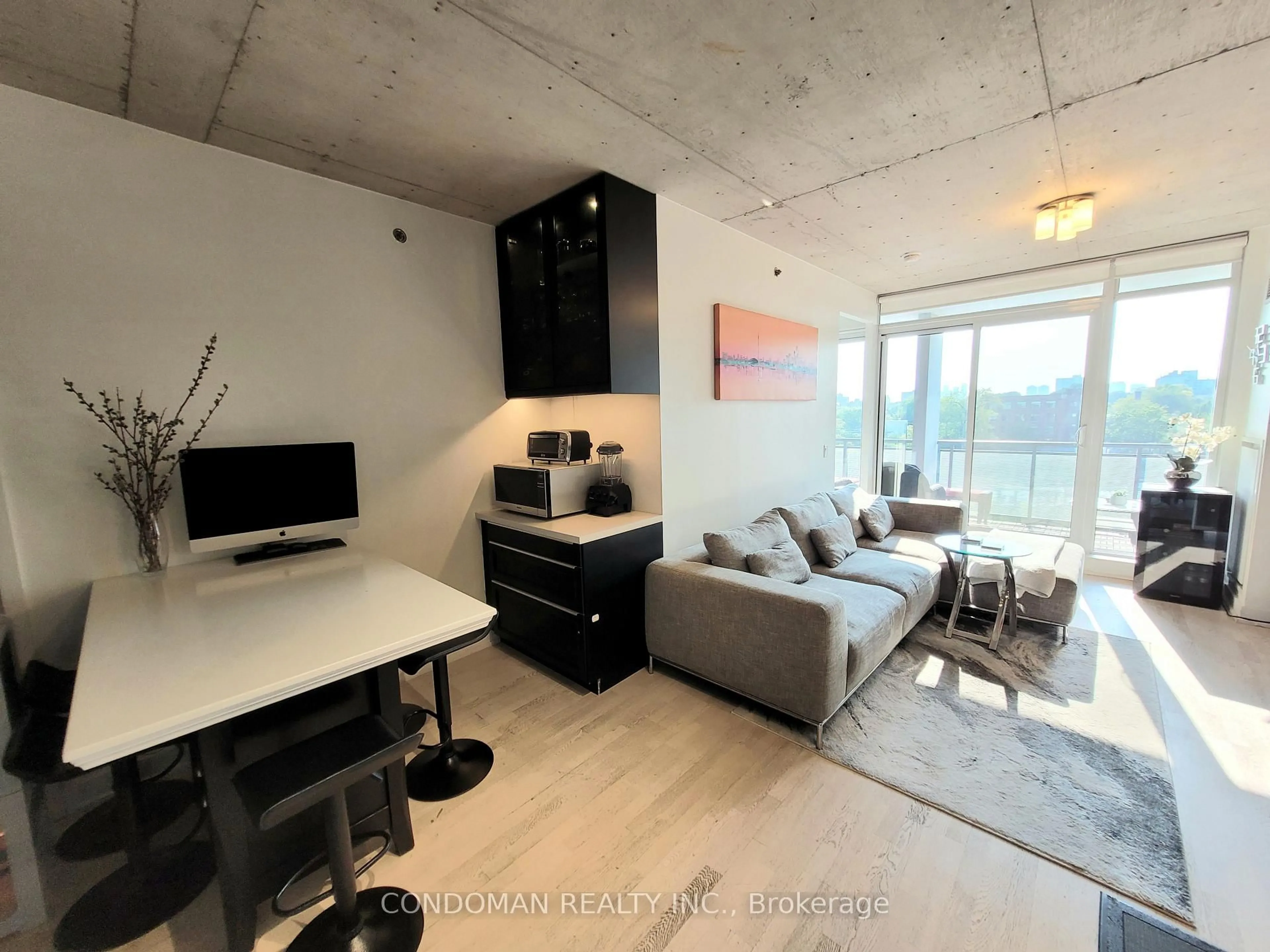 Living room with furniture, unknown for 20 Minowan Miikan Lane #618, Toronto Ontario M6J 0E5