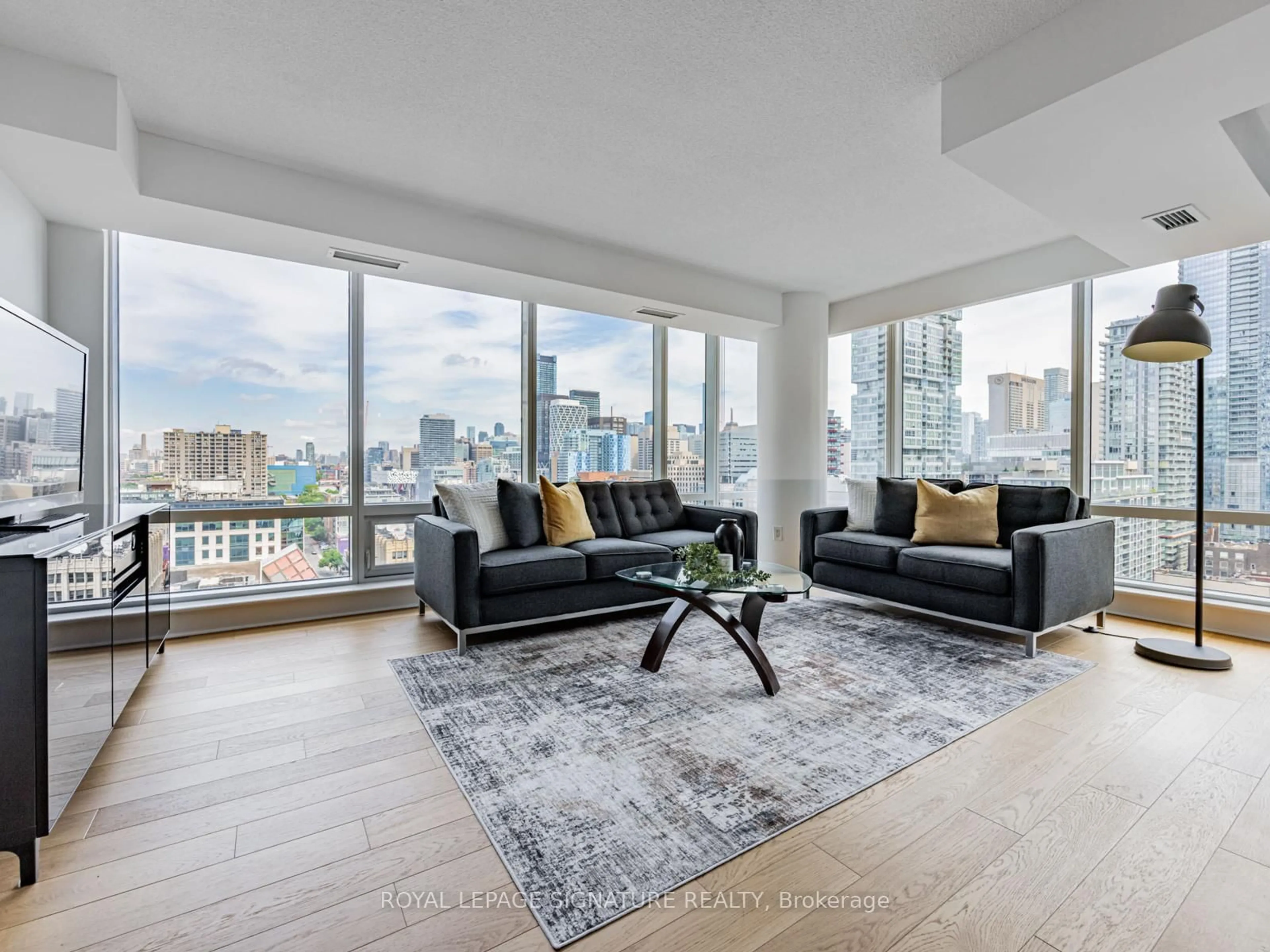 Living room with furniture, unknown for 295 Adelaide St #1804, Toronto Ontario M5V 0L4