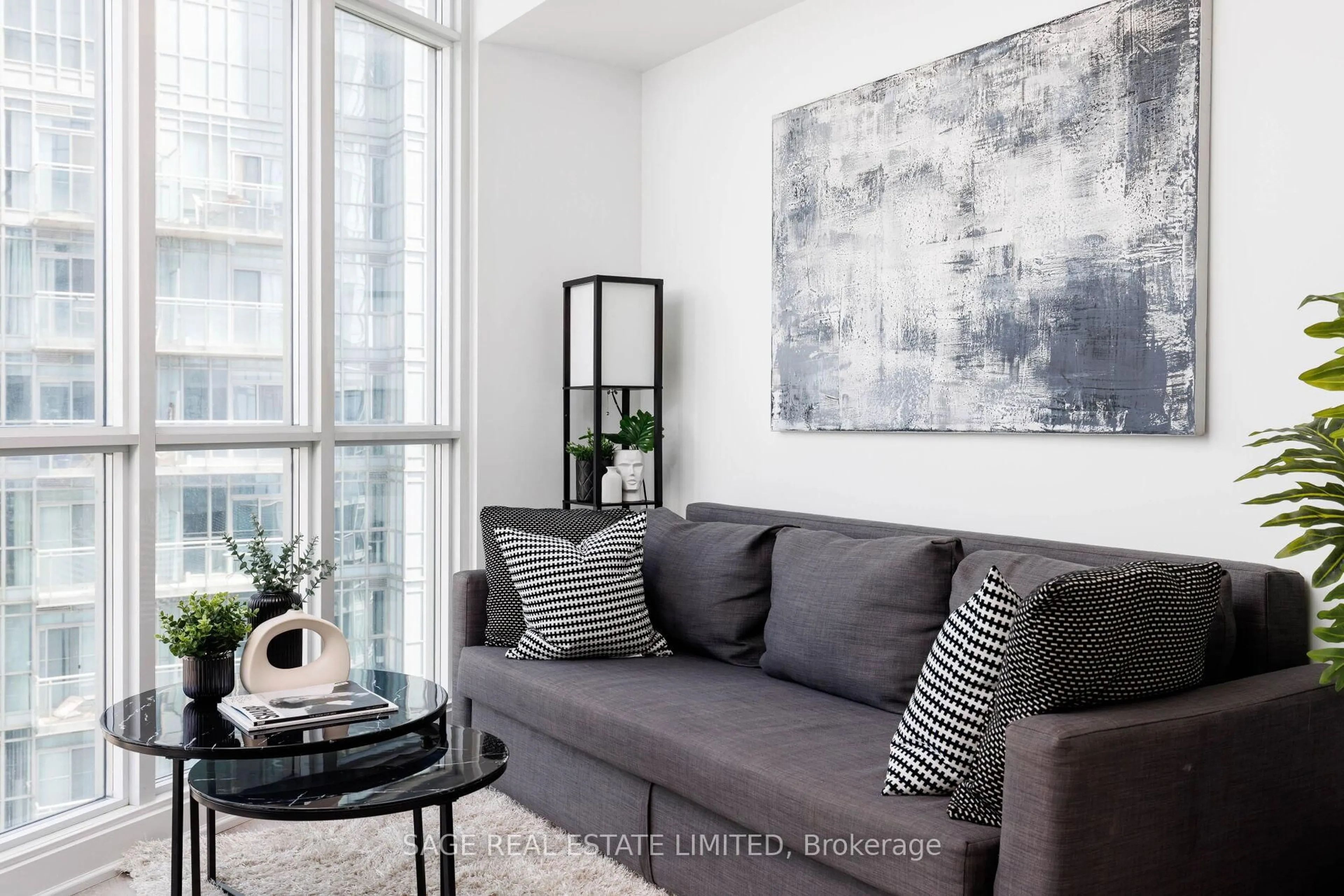 Living room with furniture, cement floor for 21 Iceboat Terr #4102, Toronto Ontario M5V 4A9