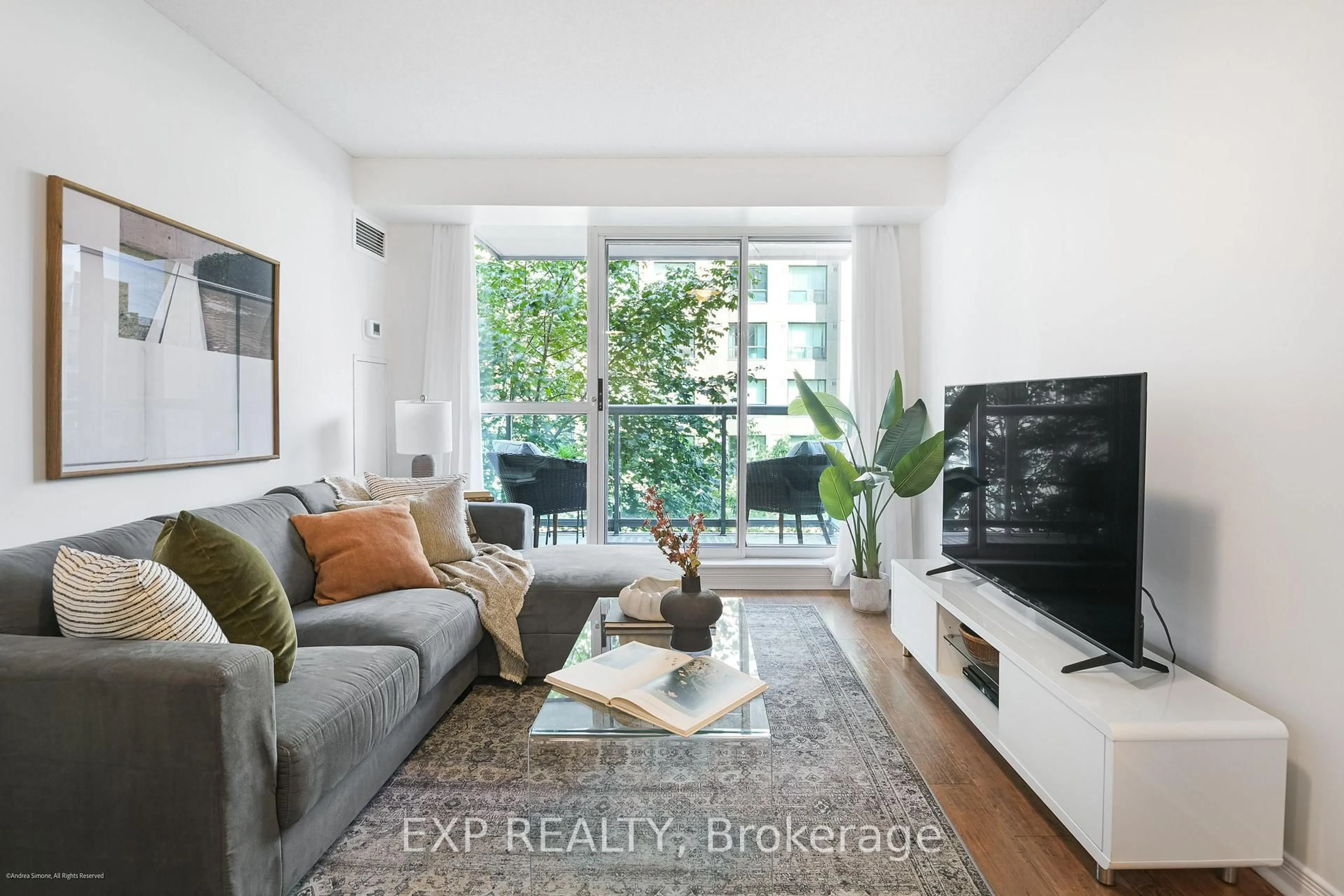 Living room with furniture, unknown for 109 Front St #527, Toronto Ontario M5A 4P7