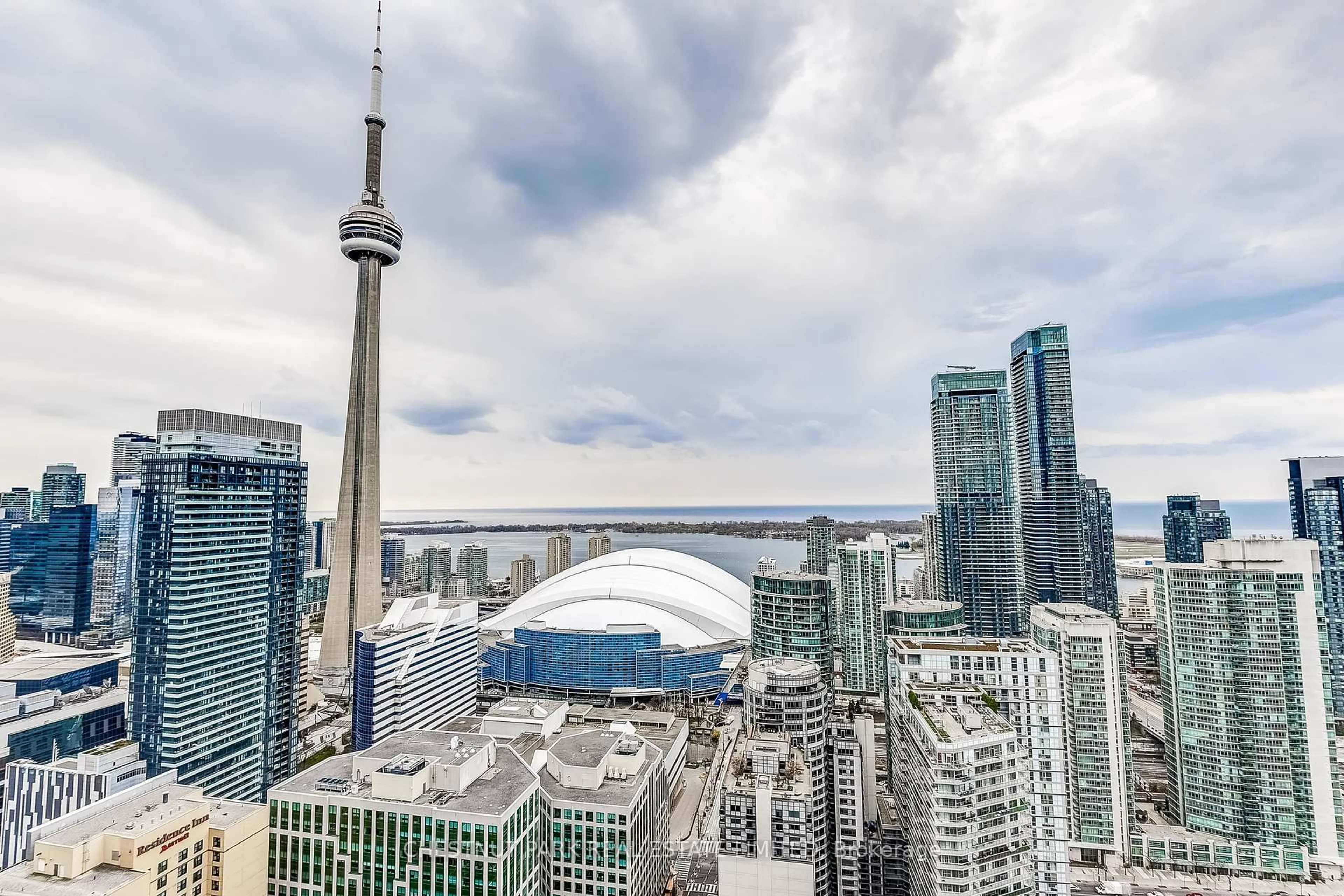 A pic from outside/outdoor area/front of a property/back of a property/a pic from drone, city buildings view from balcony for 88 Blue Jays Way #4005, Toronto Ontario M5V 2G3